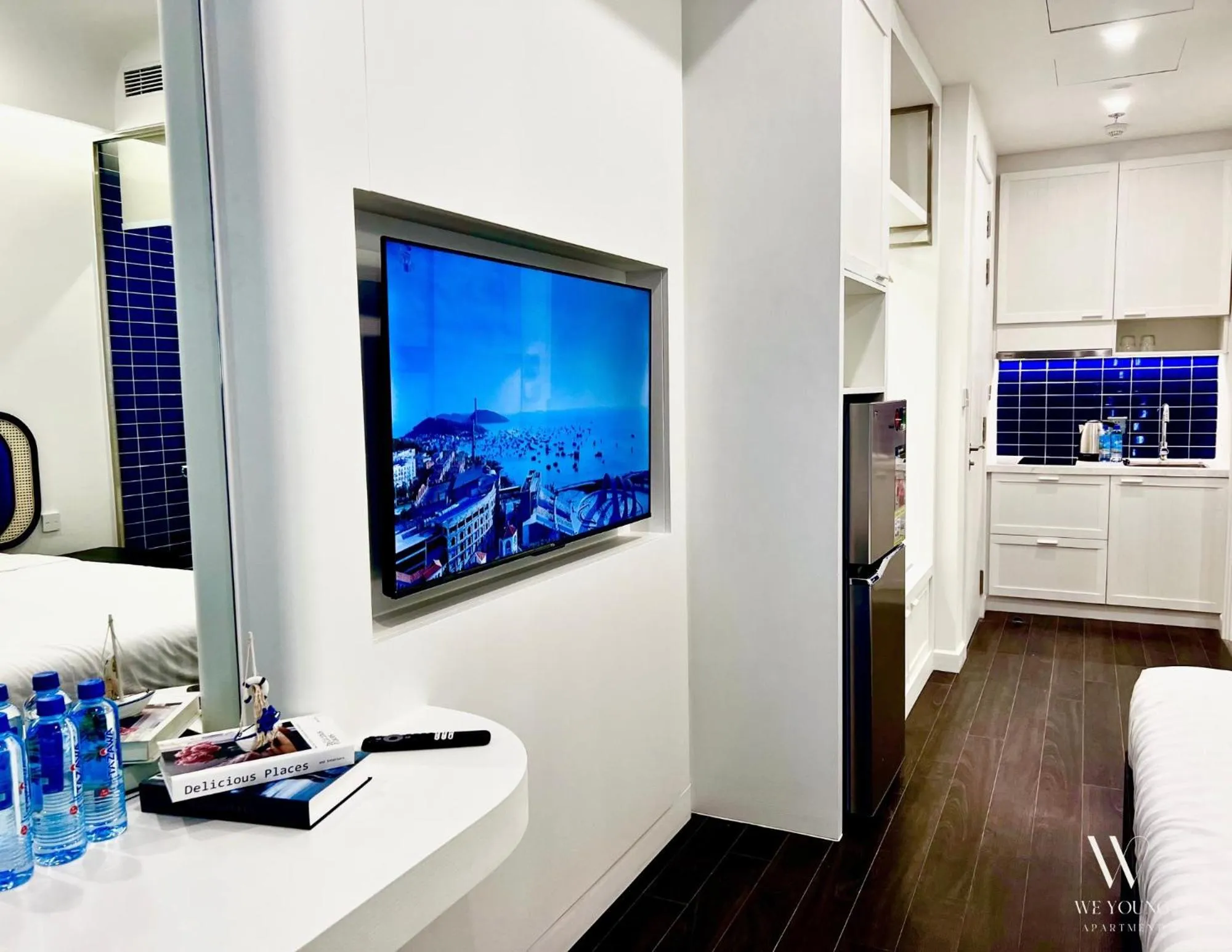 TV and multimedia in We Young Apartments by HOFs - Fireworks & Ocean view