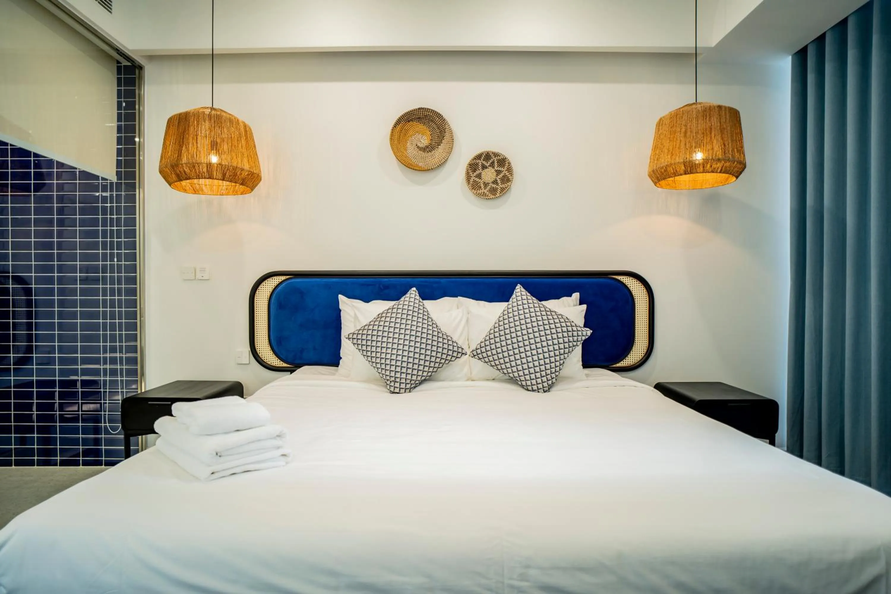 Bed in We Young Apartments by HOFs - Fireworks & Ocean view