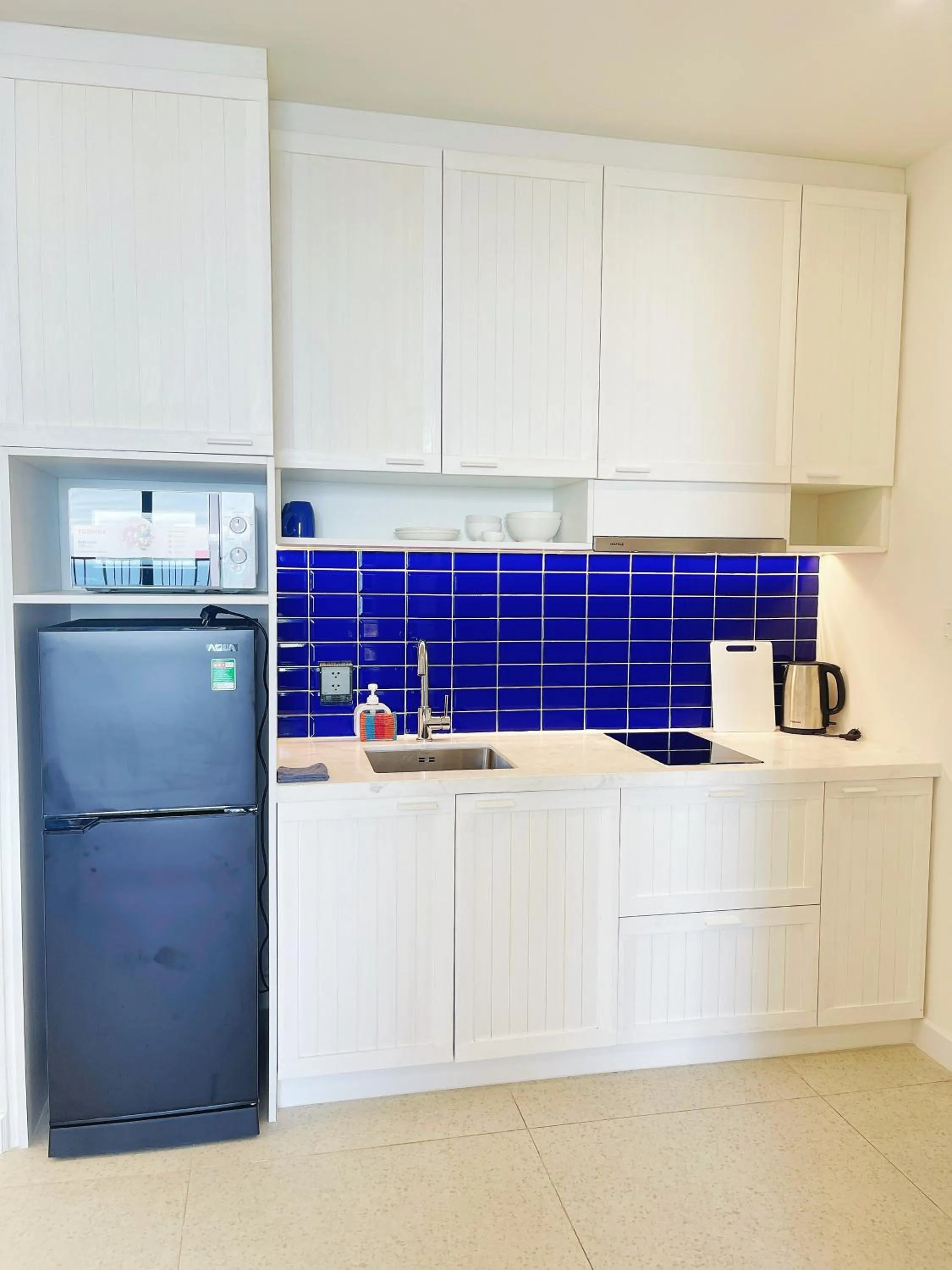 Kitchen or kitchenette in We Young Apartments by HOFs - Fireworks & Ocean view