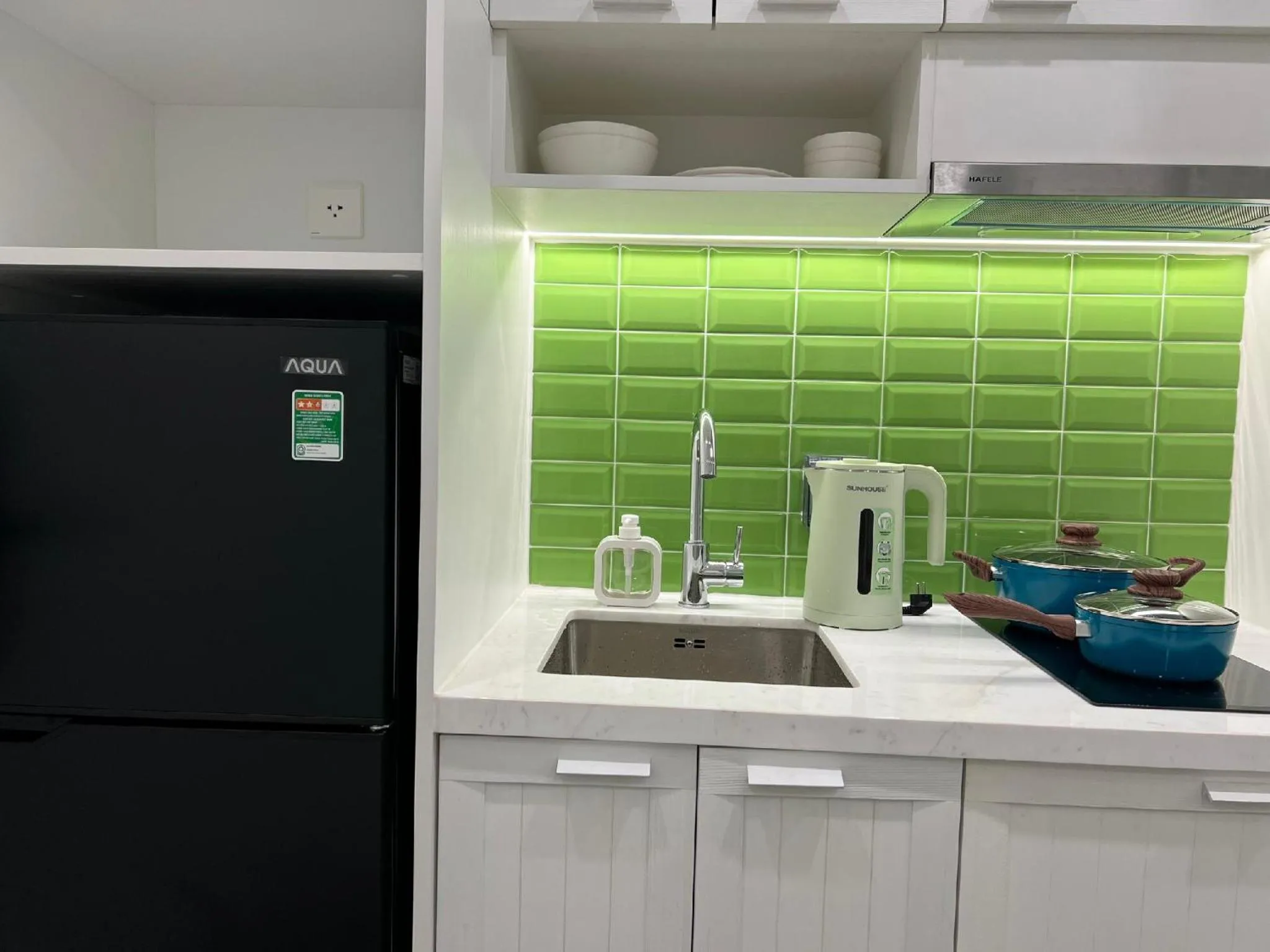 stove in We Young Apartments by HOFs - Fireworks & Ocean view