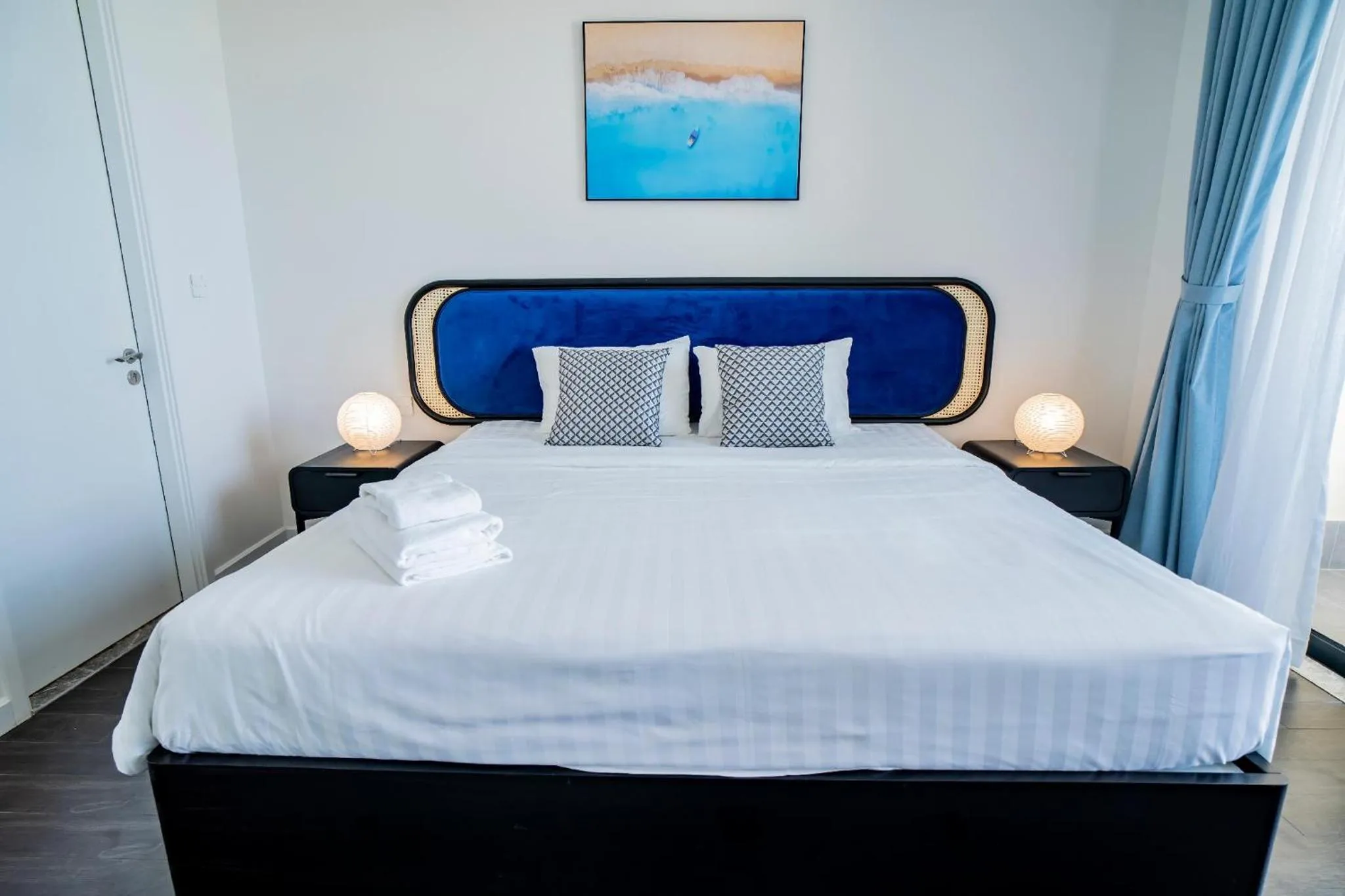 Bed in We Young Apartments by HOFs - Fireworks & Ocean view