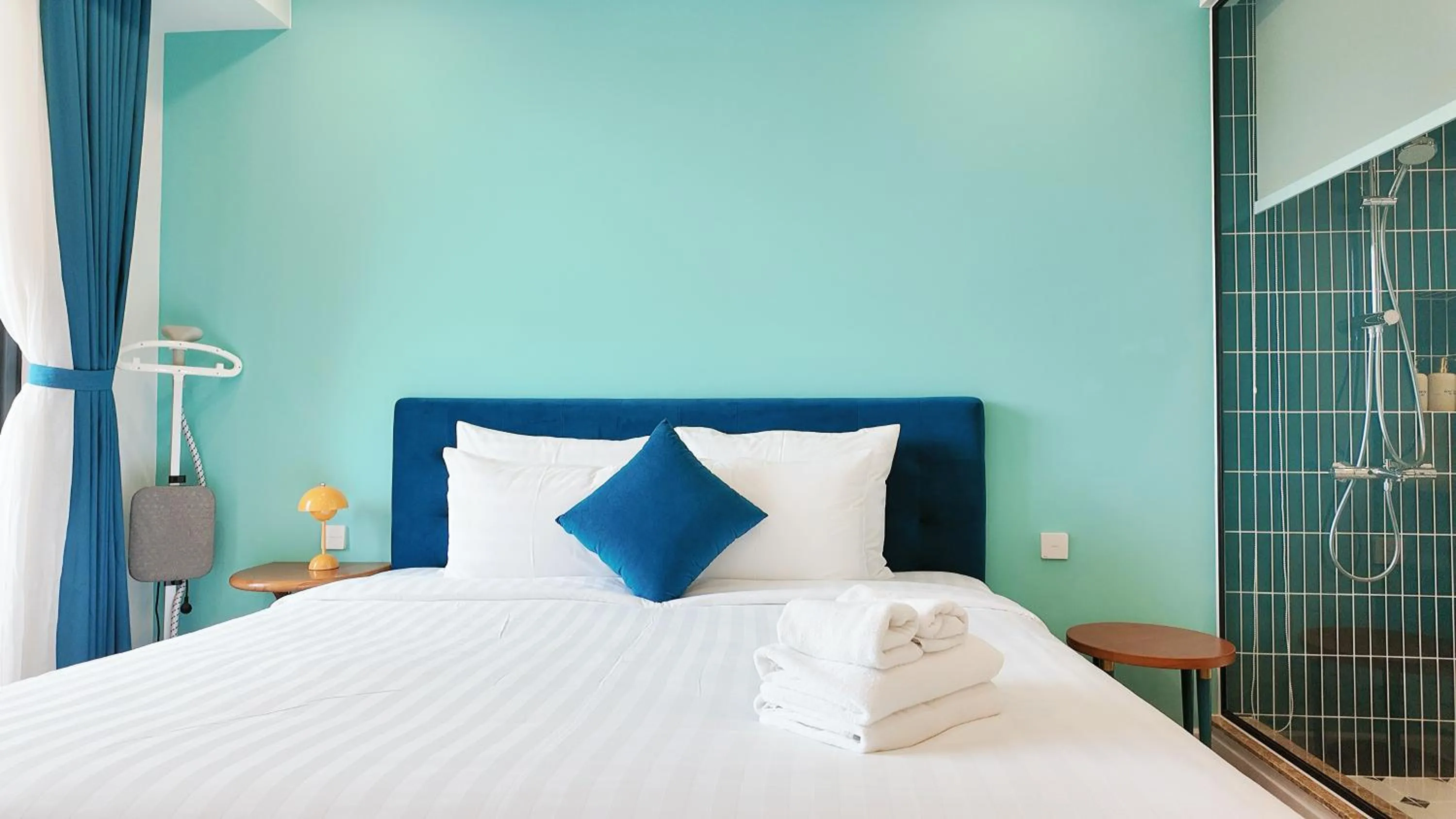 Bed in We Young Apartments by HOFs - Fireworks & Ocean view