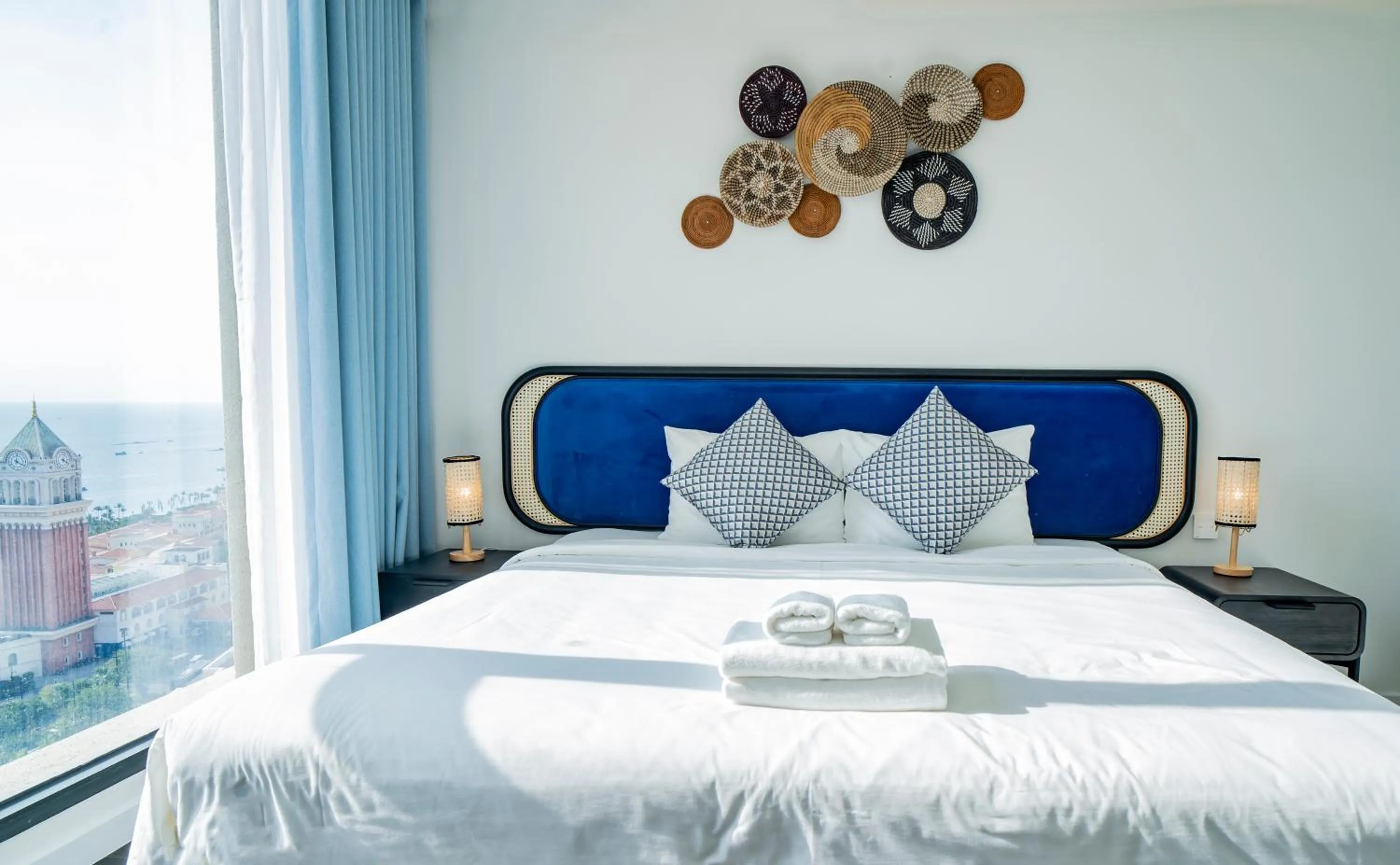 Bed in We Young Apartments by HOFs - Fireworks & Ocean view