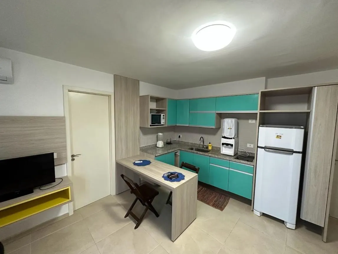 Kitchen or kitchenette in ApartHotel Praia dos Carneiros