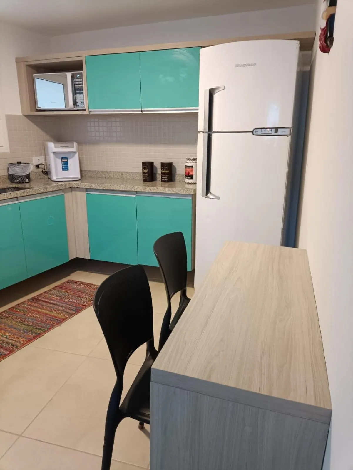 Kitchen or kitchenette in ApartHotel Praia dos Carneiros