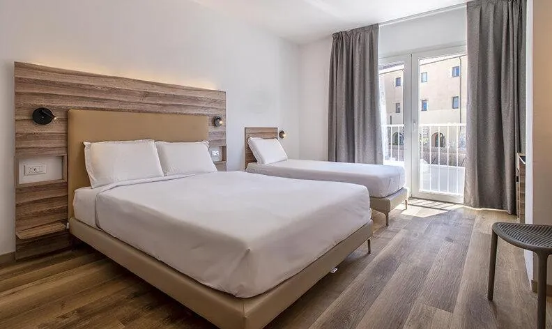 Photo of the whole room, Bed in B&B HOTEL Sassari