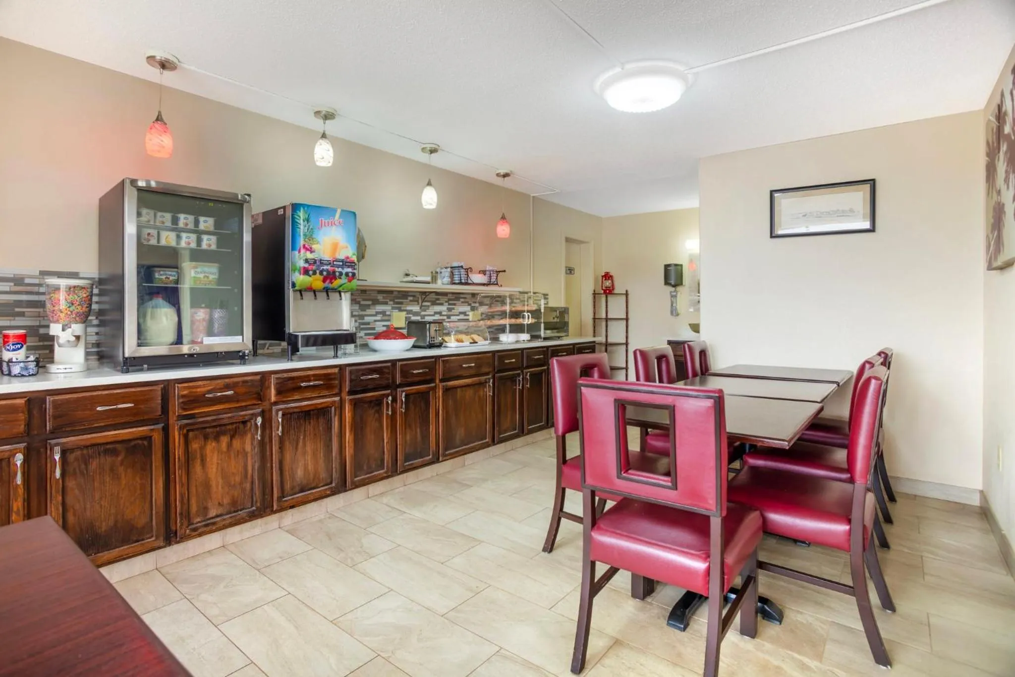 Breakfast in HomeTowne Studios by Red Roof Huntsville - Madison