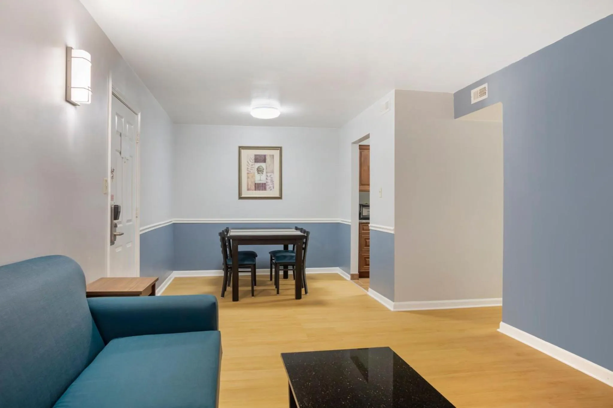 Photo of the whole room in HomeTowne Studios by Red Roof Huntsville - Madison