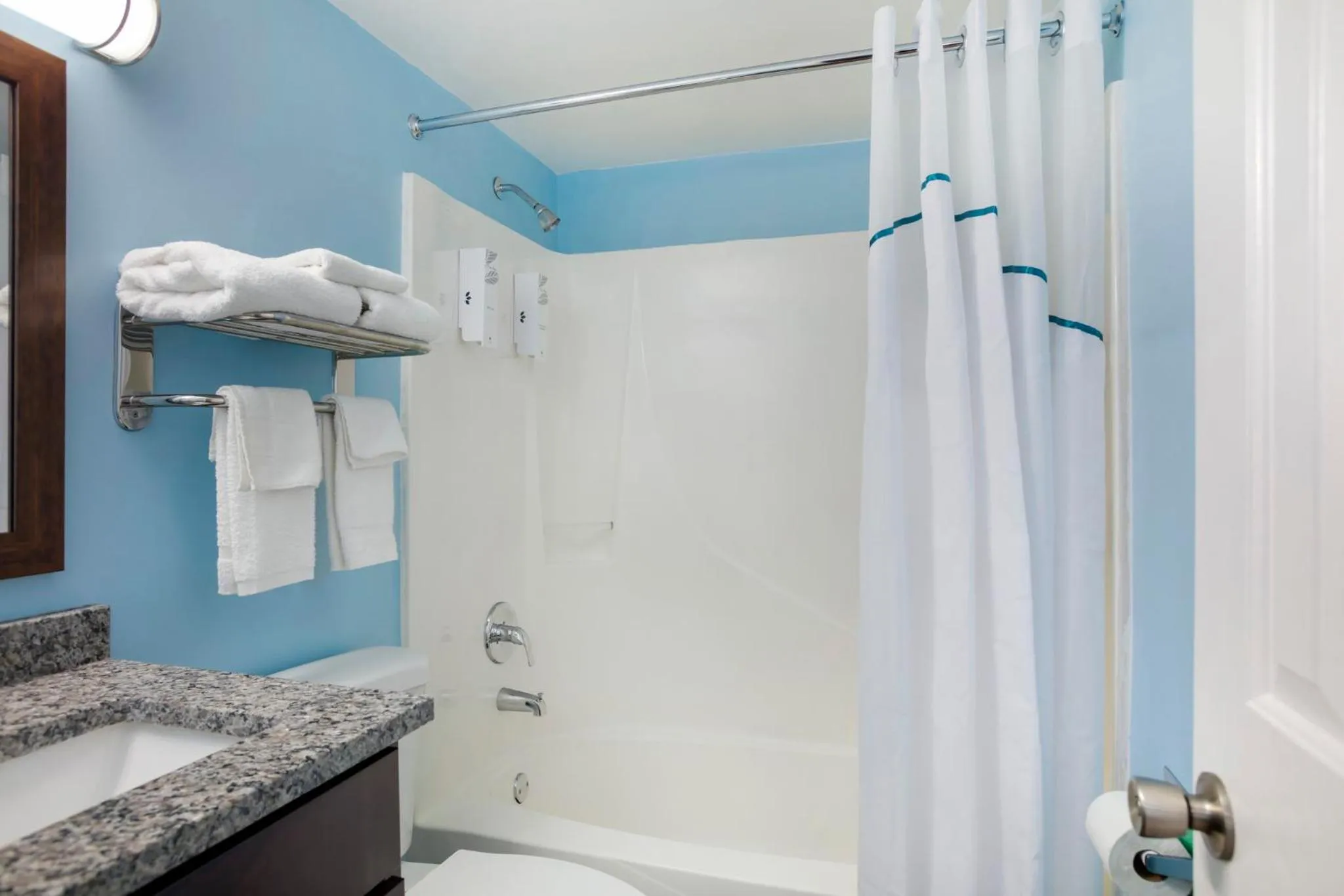 Bathroom in HomeTowne Studios by Red Roof Huntsville - Madison