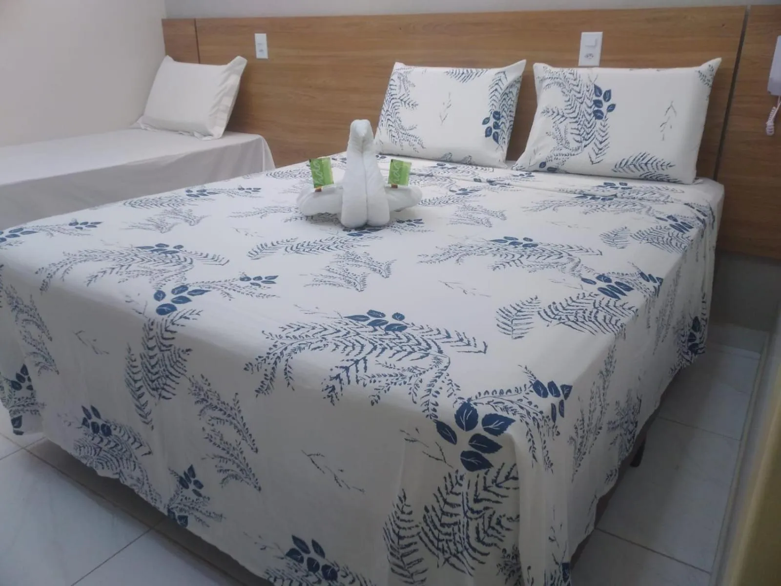 Bed in Pousada Beija Flor