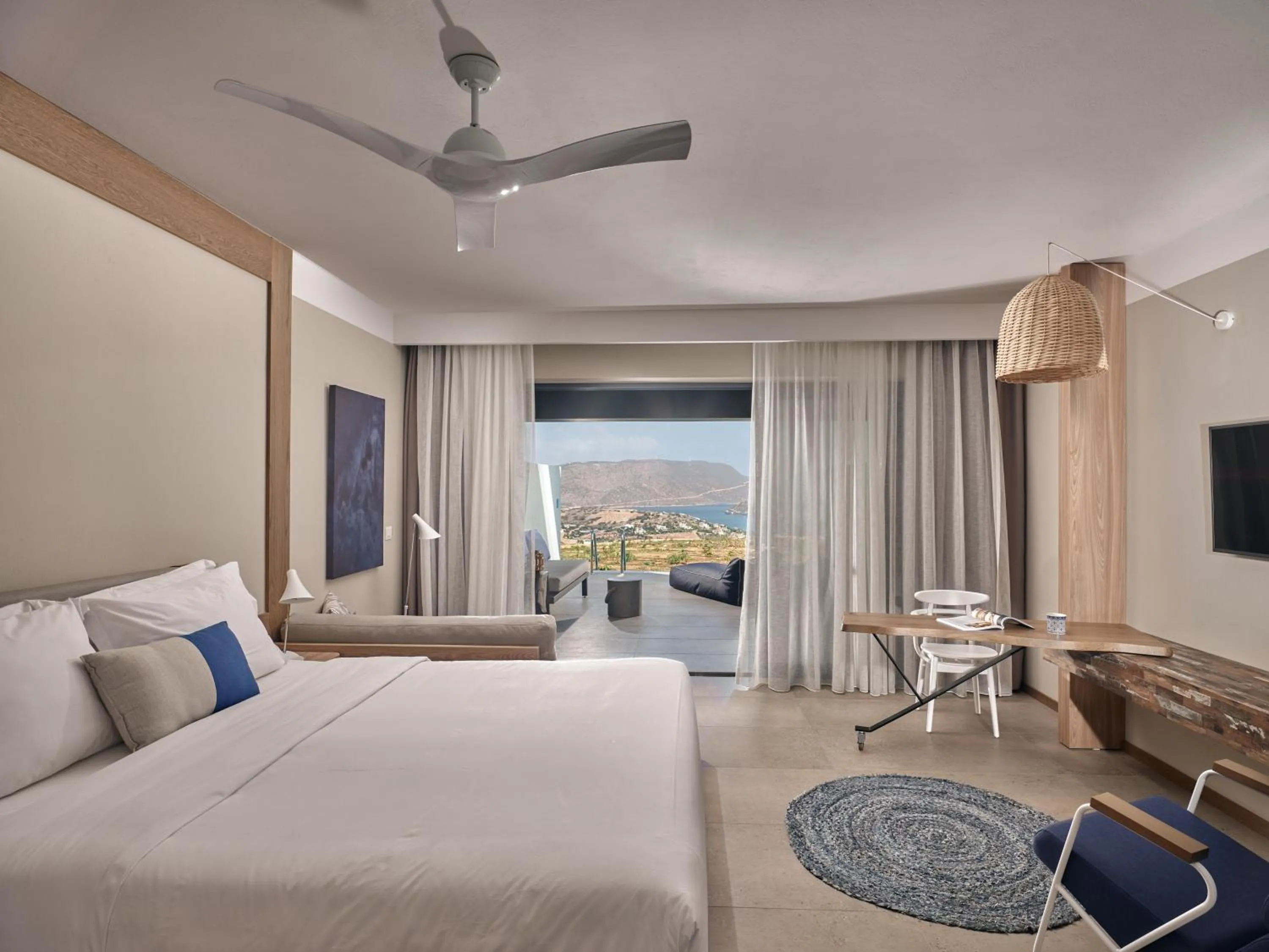 Photo of the whole room, Bed in Domes Aulus Elounda All-Inclusive Resort, Adults only, Curio by Hilton
