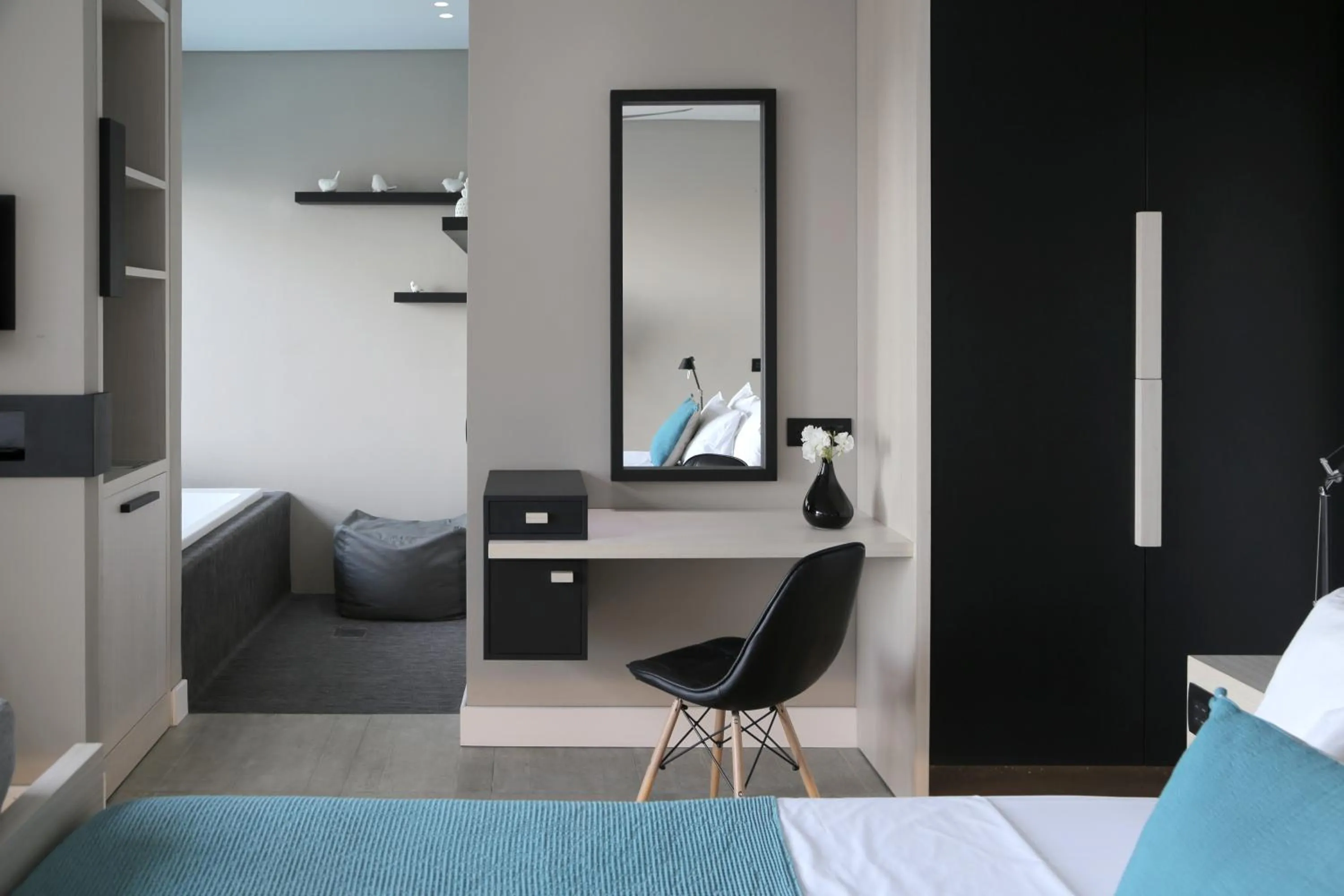 Seating area, Bed in Domes Aulus Elounda All-Inclusive Resort, Adults only, Curio by Hilton