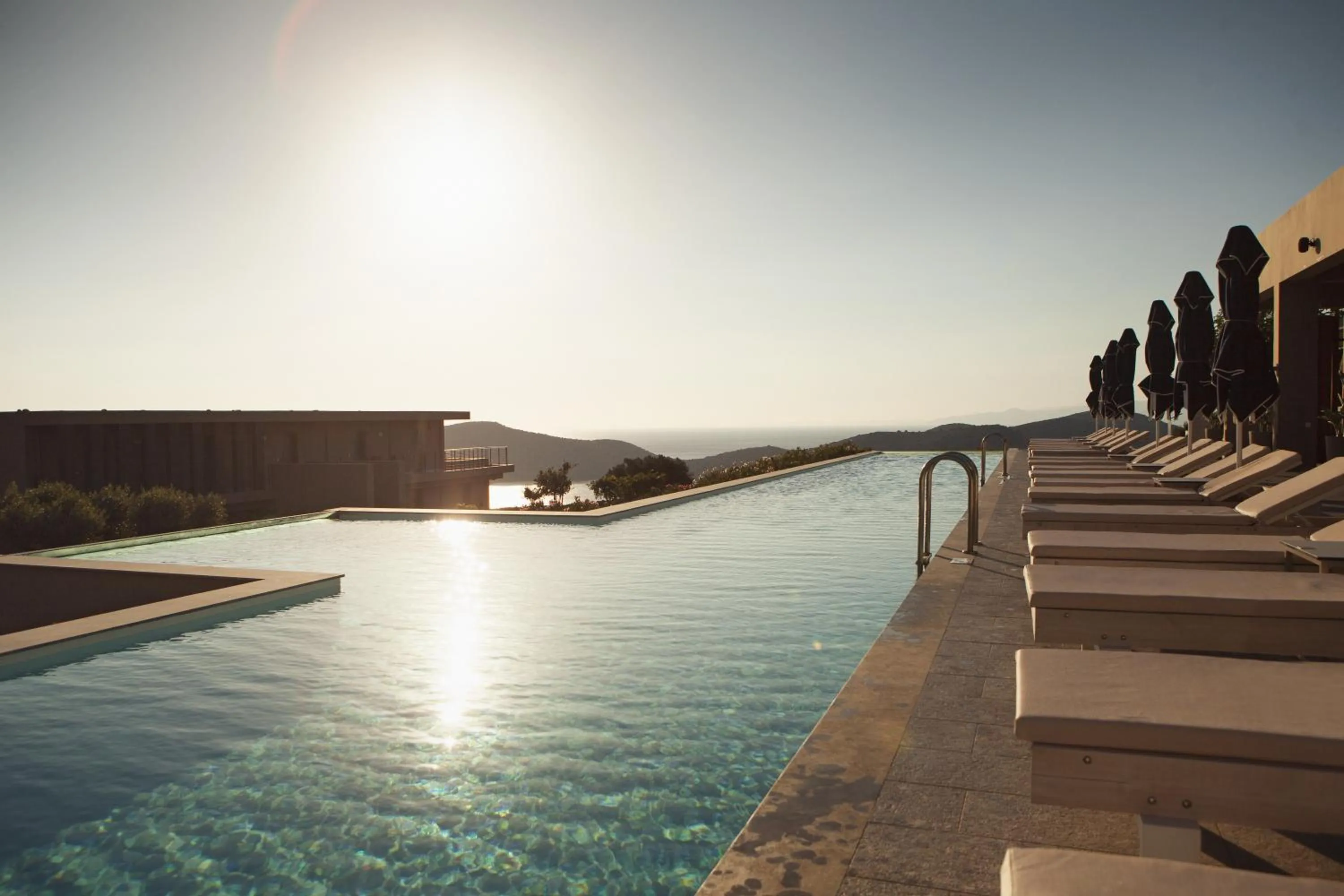 Swimming pool in Domes Aulus Elounda All-Inclusive Resort, Adults only, Curio by Hilton