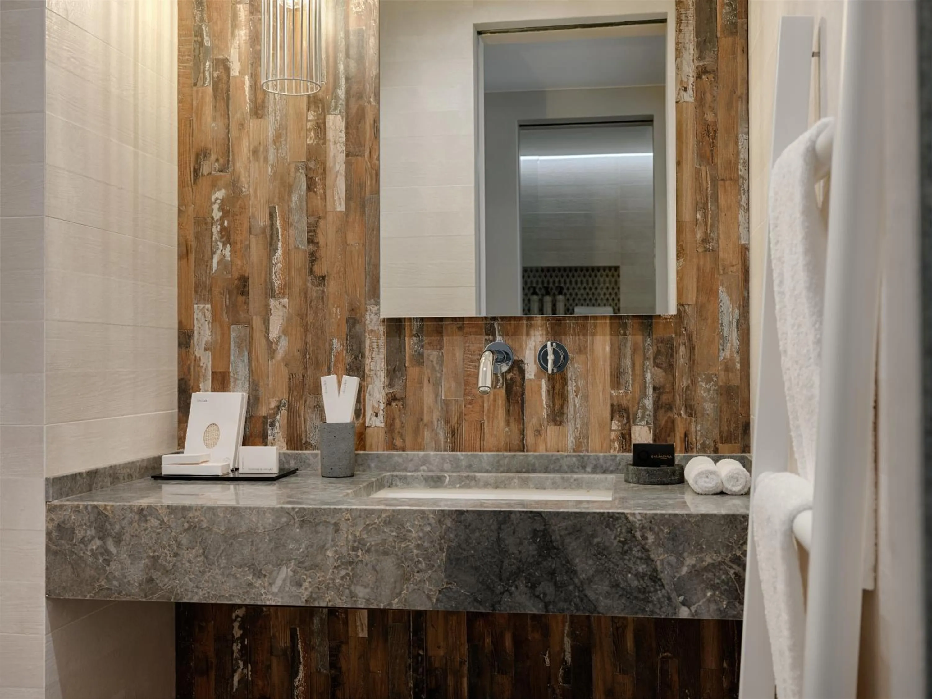 Bathroom in Domes Aulus Elounda All-Inclusive Resort, Adults only, Curio by Hilton