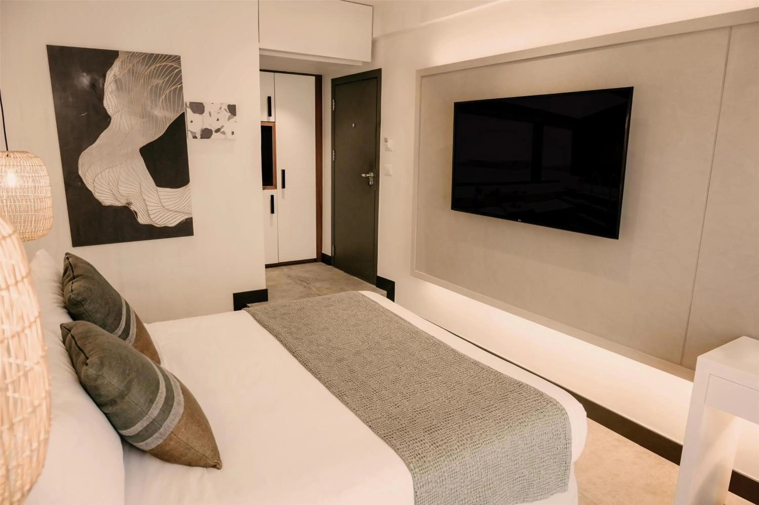 Bed in Domes Aulus Elounda All-Inclusive Resort, Adults only, Curio by Hilton