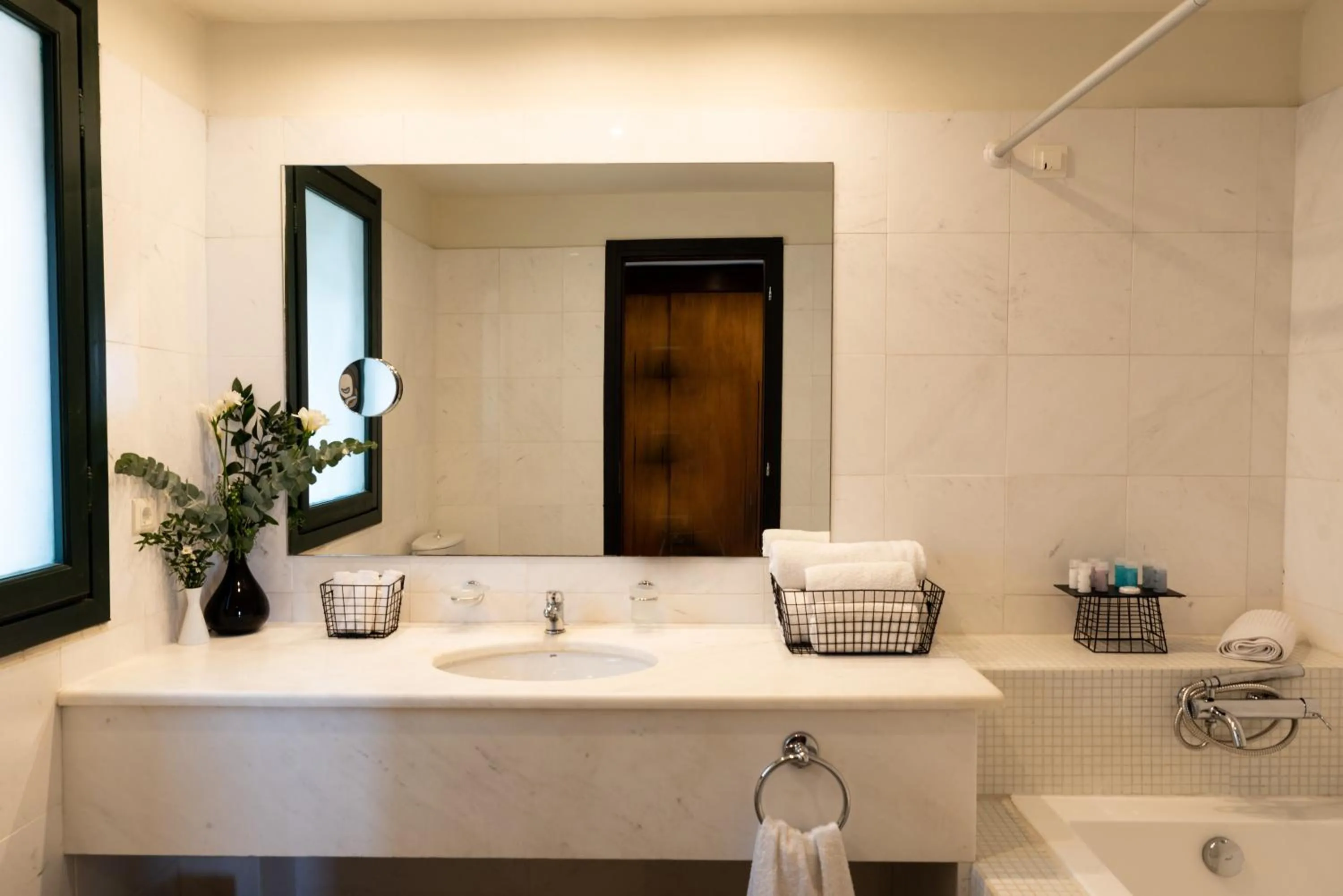 Bathroom in Domes Aulus Elounda All-Inclusive Resort, Adults only, Curio by Hilton