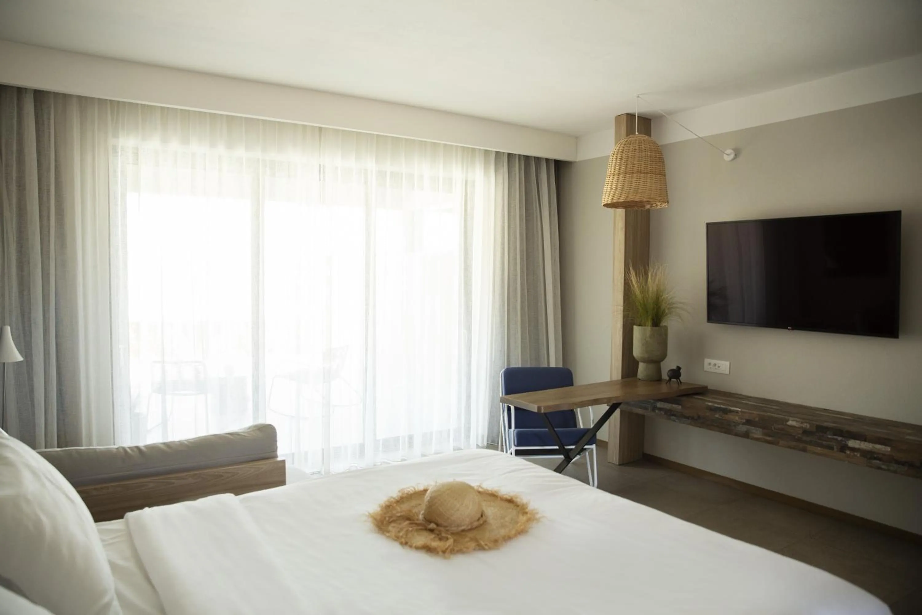 Bed in Domes Aulus Elounda All-Inclusive Resort, Adults only, Curio by Hilton