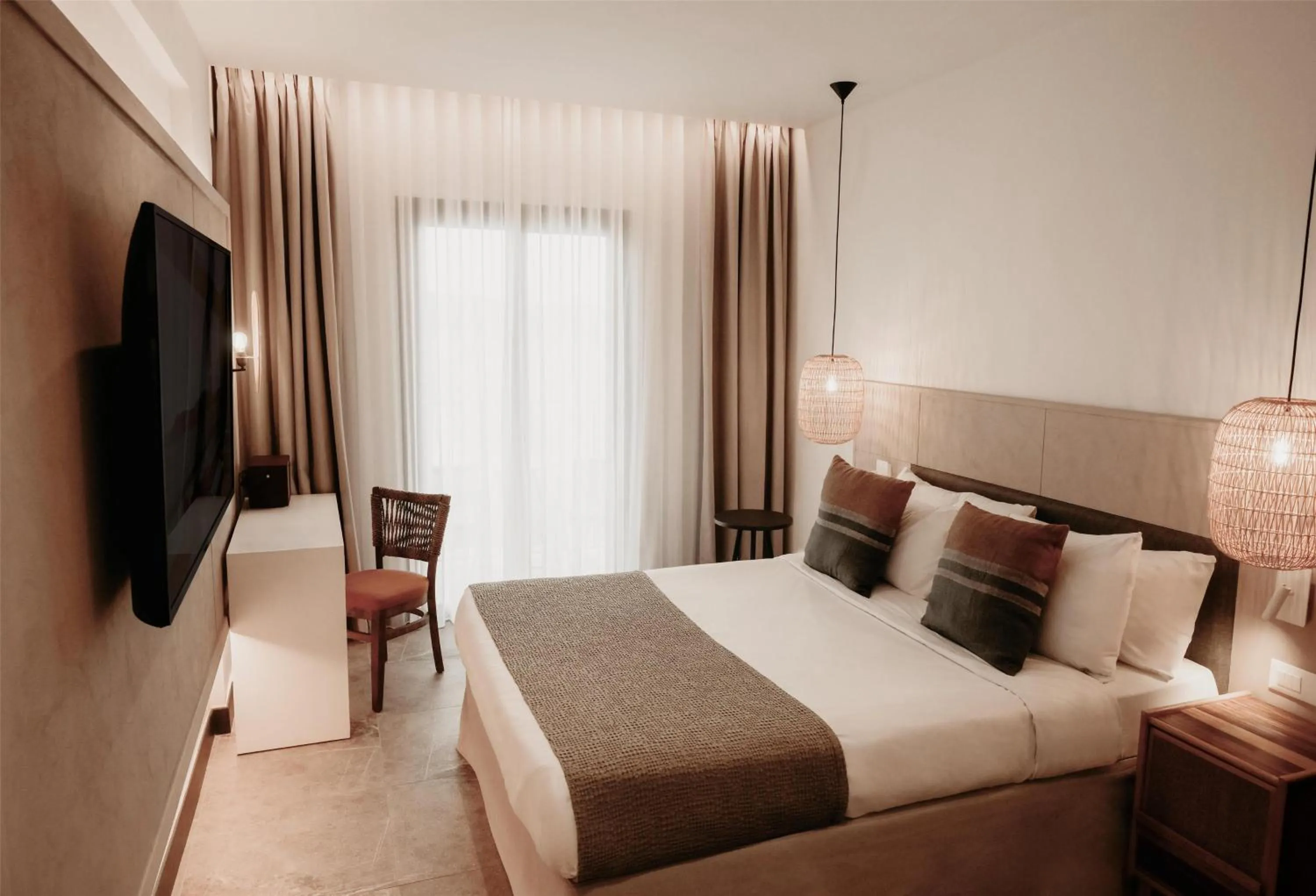 Bed in Domes Aulus Elounda All-Inclusive Resort, Adults only, Curio by Hilton