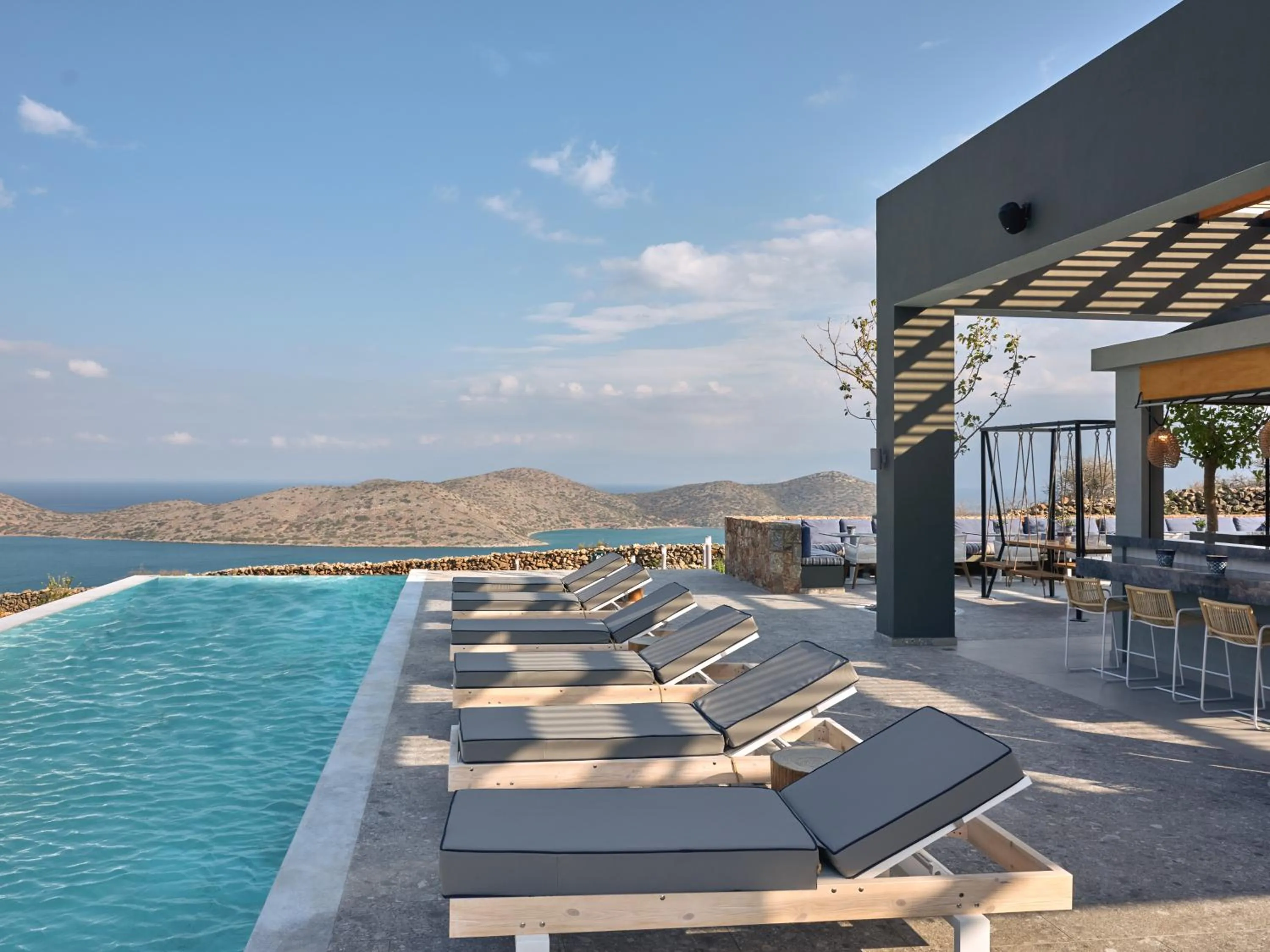 Pool view in Domes Aulus Elounda All-Inclusive Resort, Adults only, Curio by Hilton