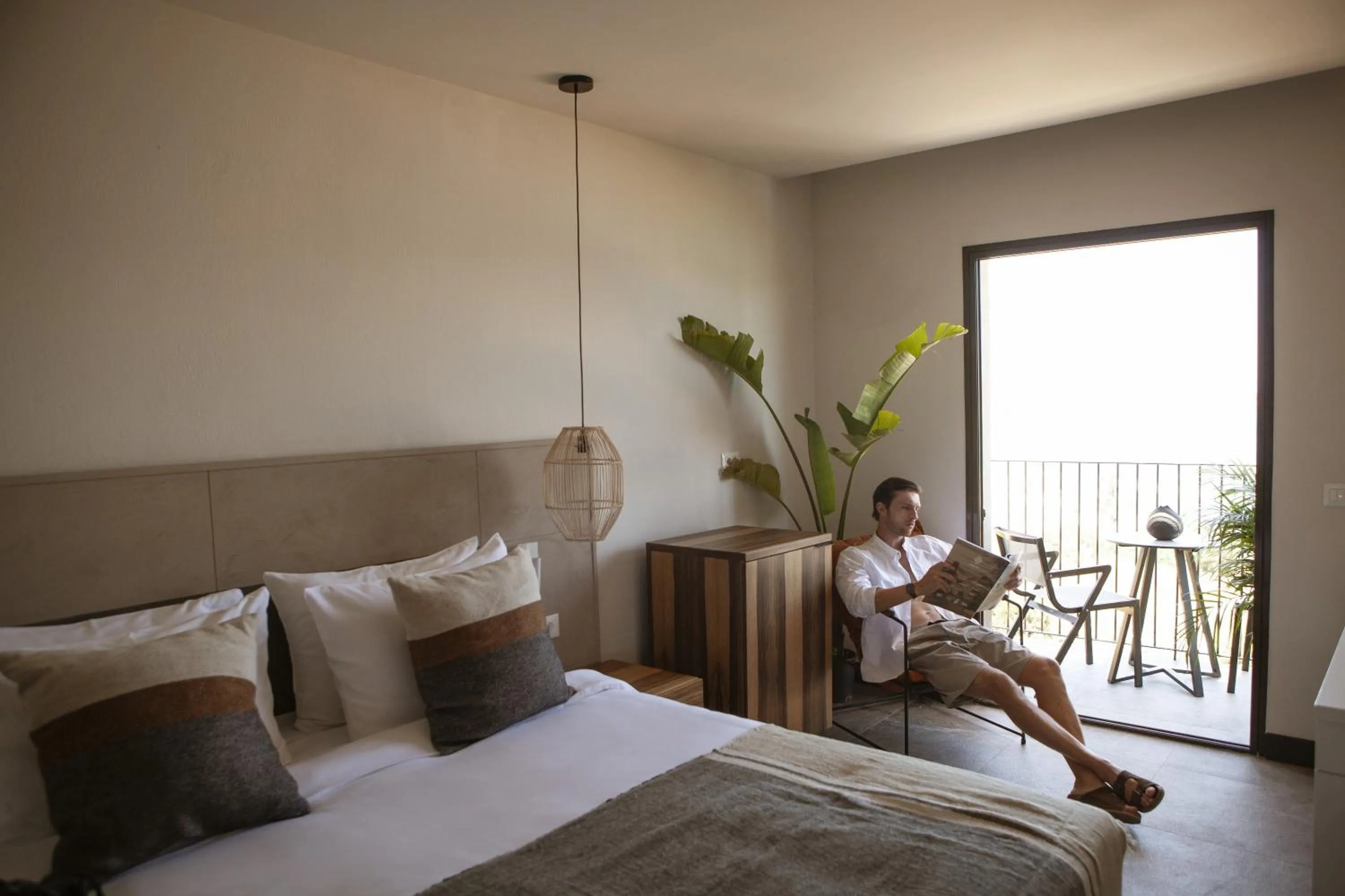 Bed in Domes Aulus Elounda All-Inclusive Resort, Adults only, Curio by Hilton