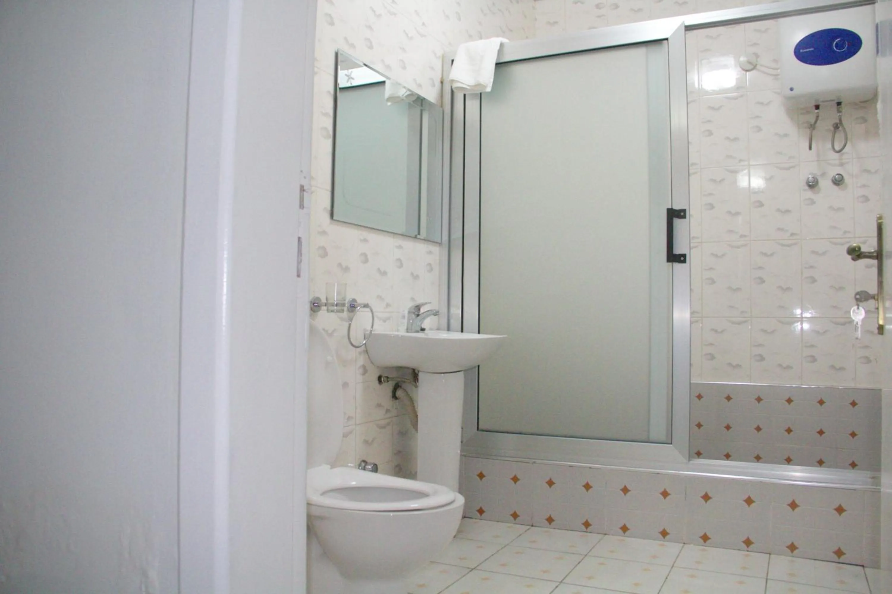 Bathroom in Gold Plus Hotel Ghana