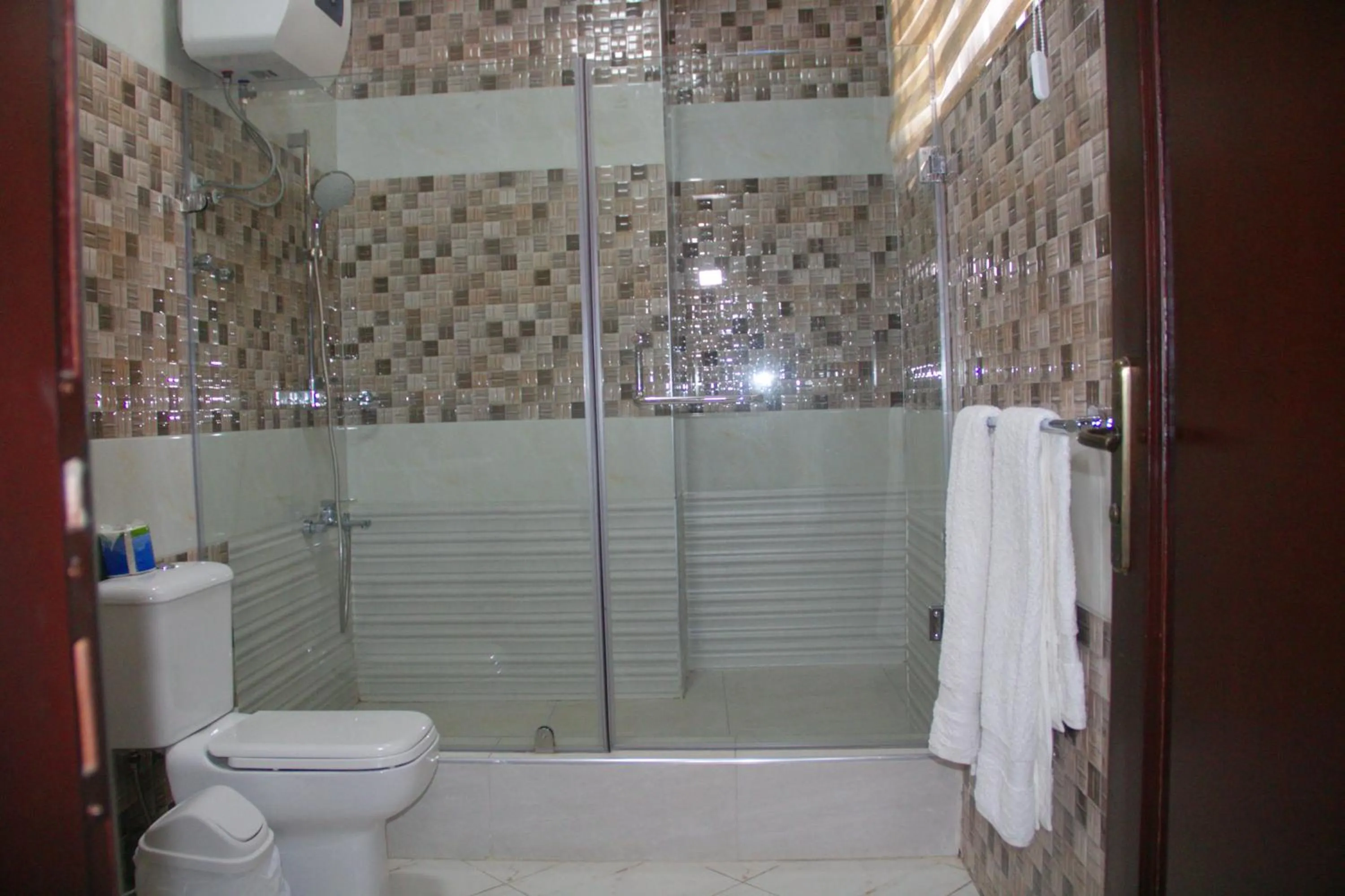 Shower in Gold Plus Hotel Ghana