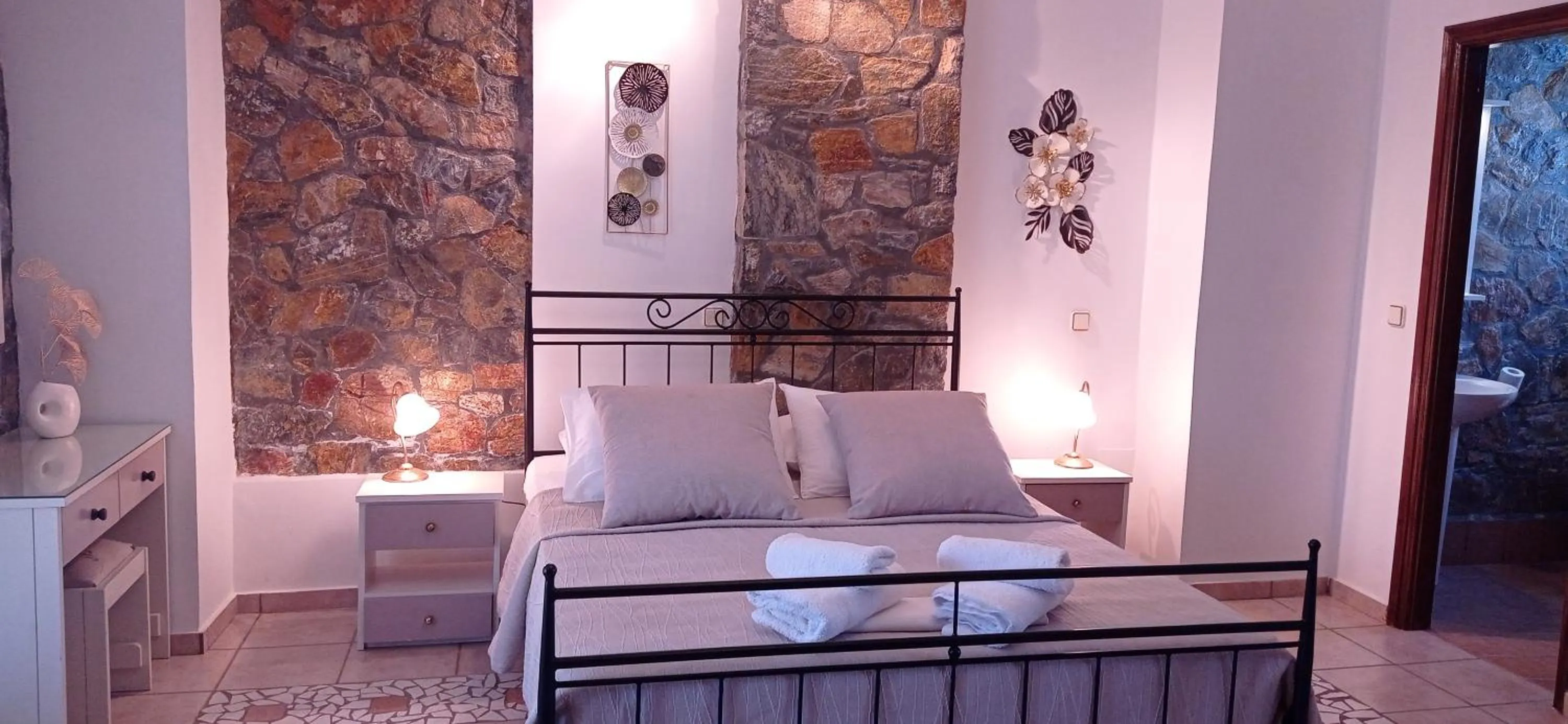Bed in Elia Village by Irida Iris Group