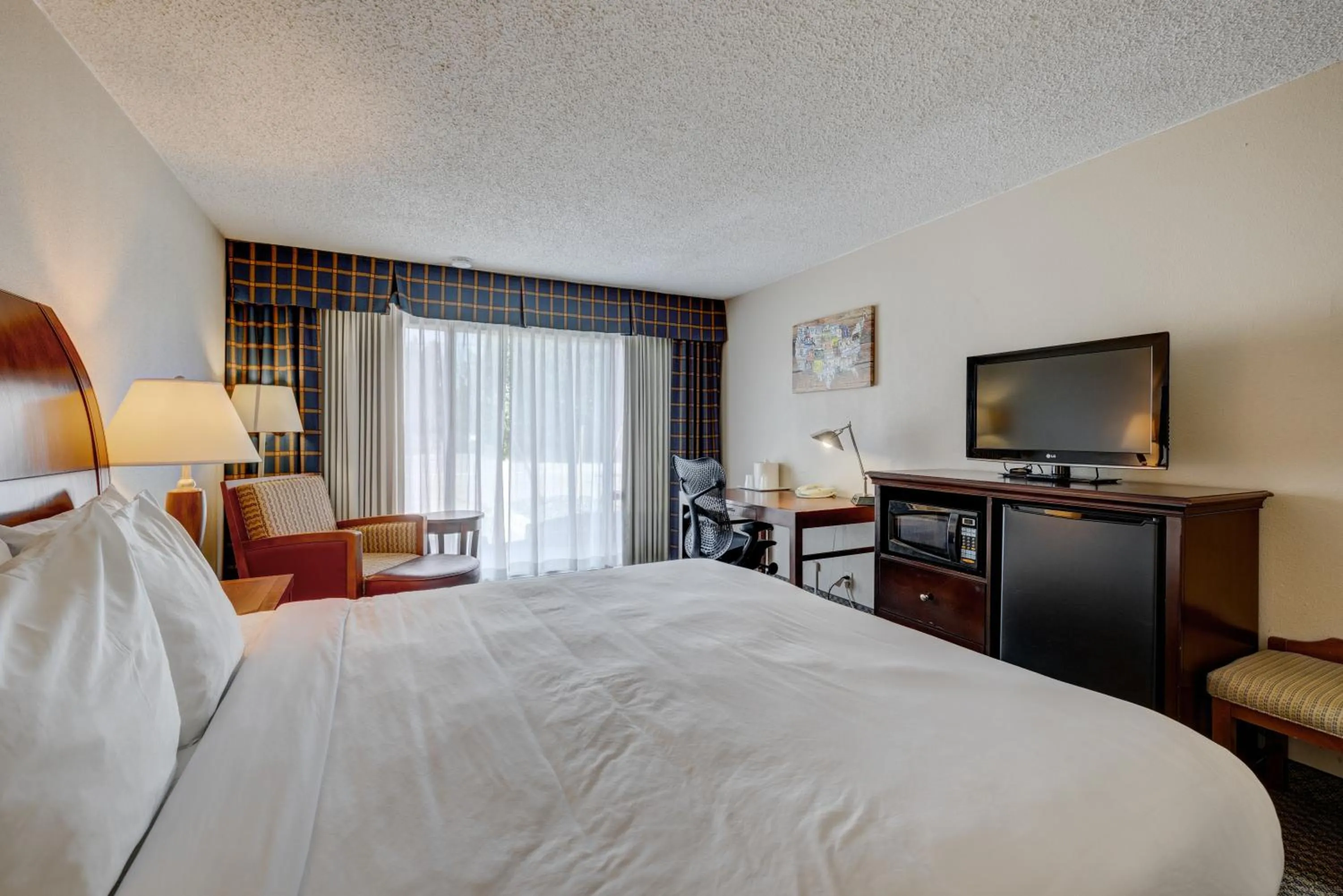 Photo of the whole room, Bed in Riverside Hotel