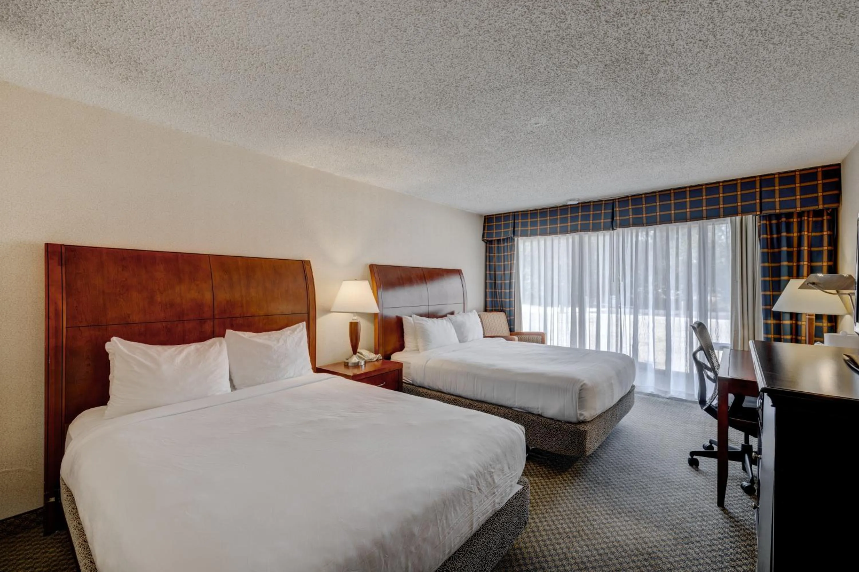 Photo of the whole room, Bed in Riverside Hotel