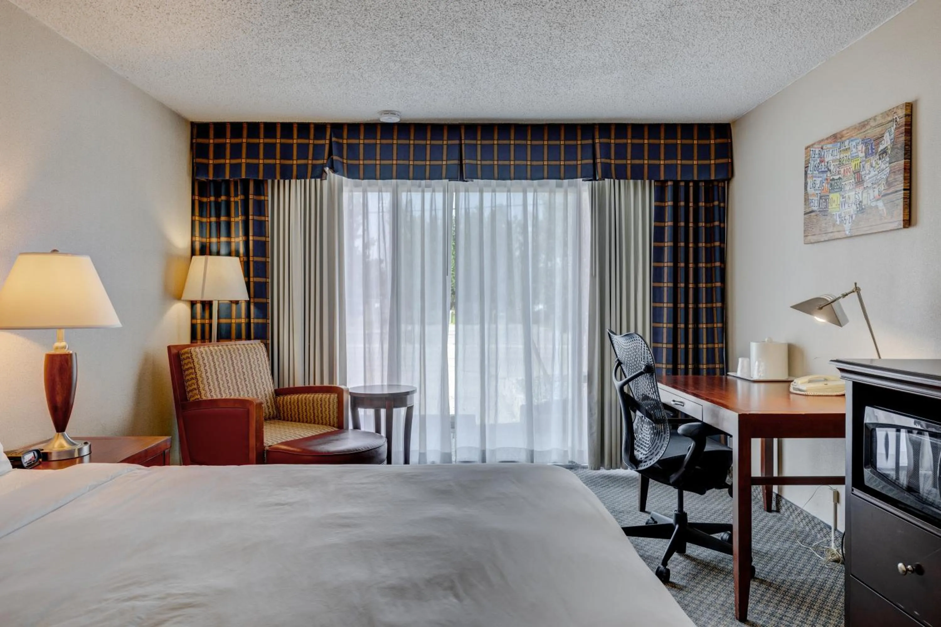 Photo of the whole room, Bed in Riverside Hotel