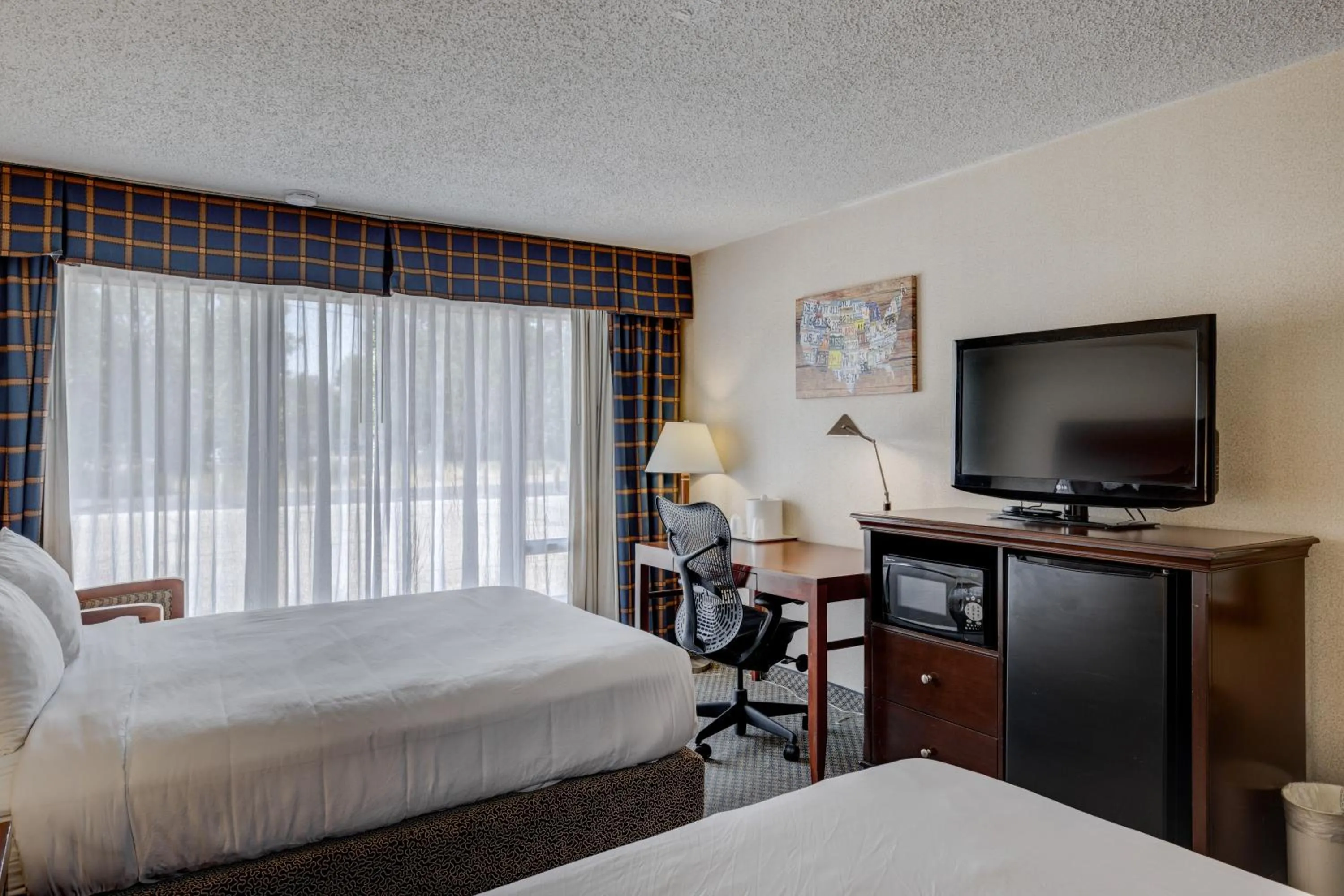 Photo of the whole room, Bed in Riverside Hotel