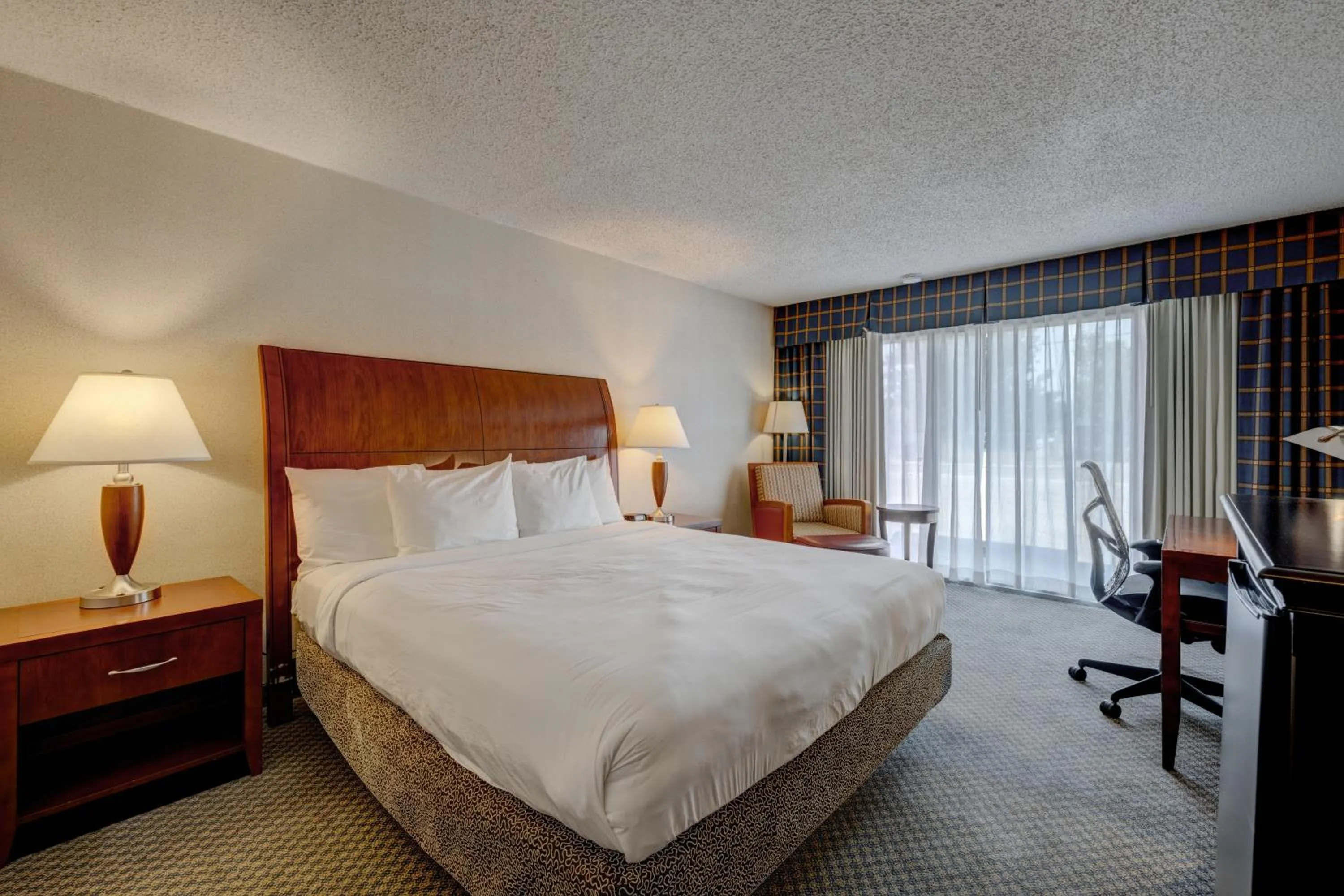 Photo of the whole room, Bed in Riverside Hotel