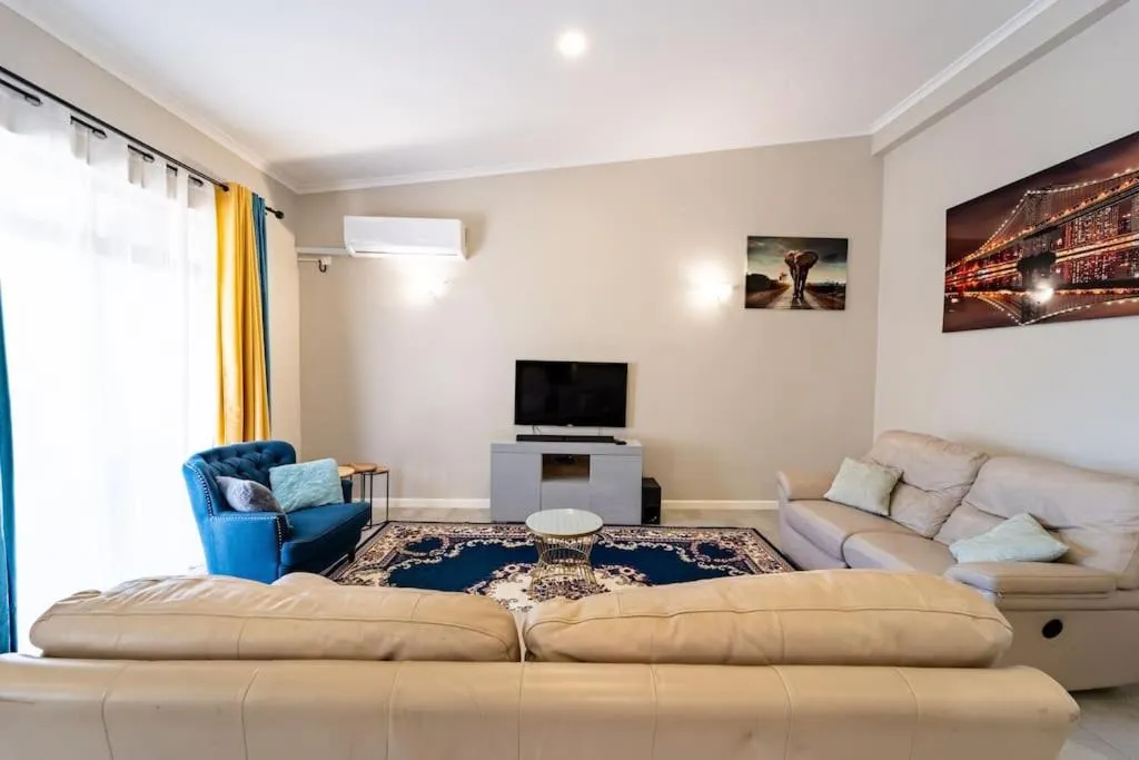 Communal lounge/ TV room in 124 Platinum Peak ,Victoria Falls