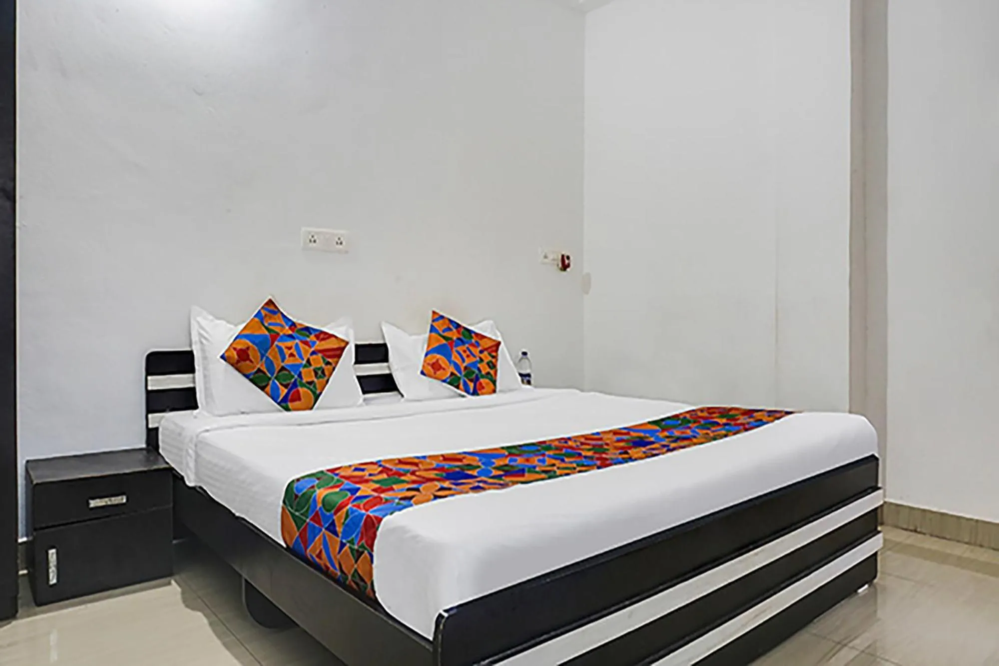 Bed in FabHotel Galaxy Airport Inn, Airport Road