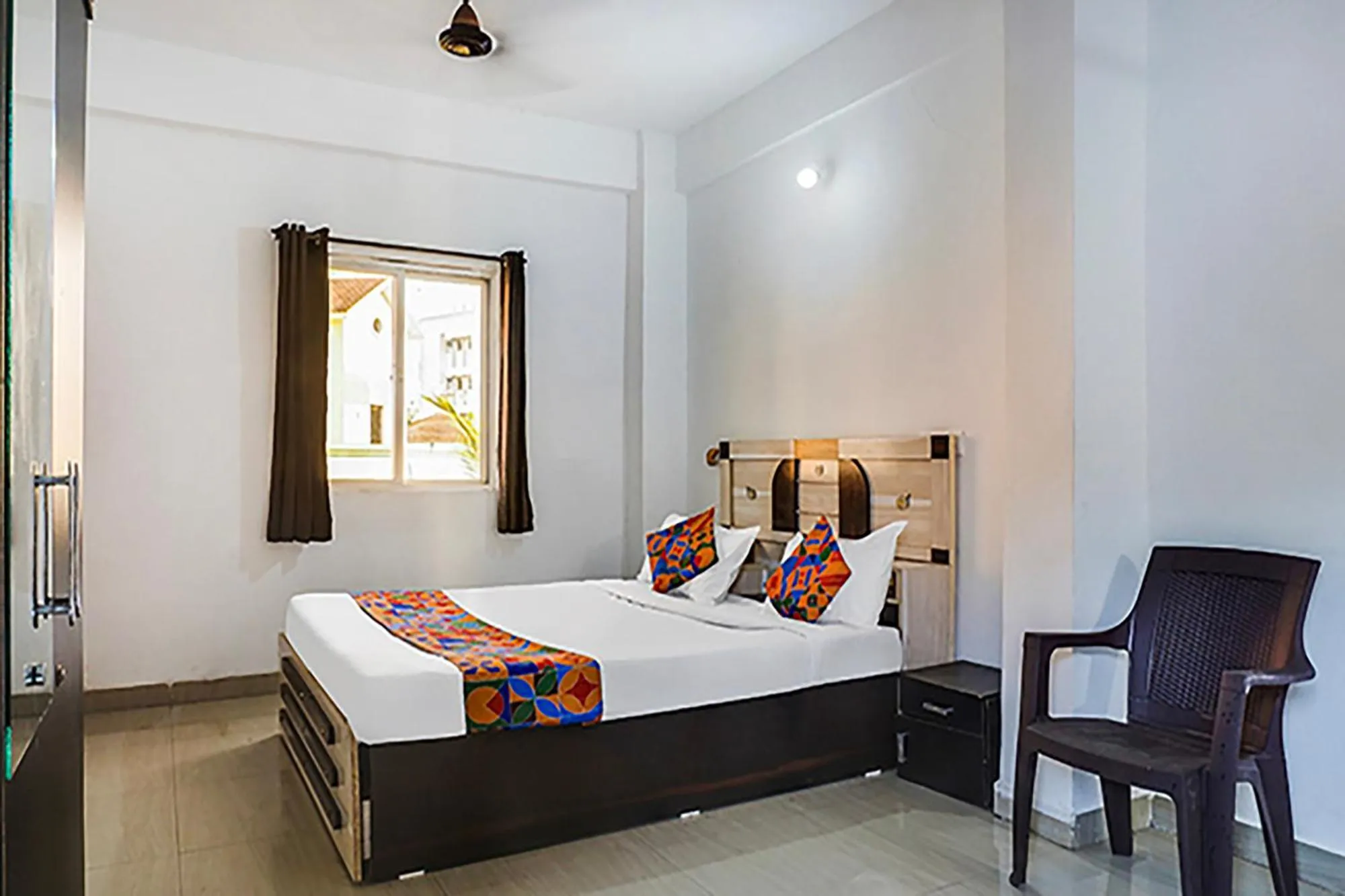 Bed in FabHotel Galaxy Airport Inn, Airport Road