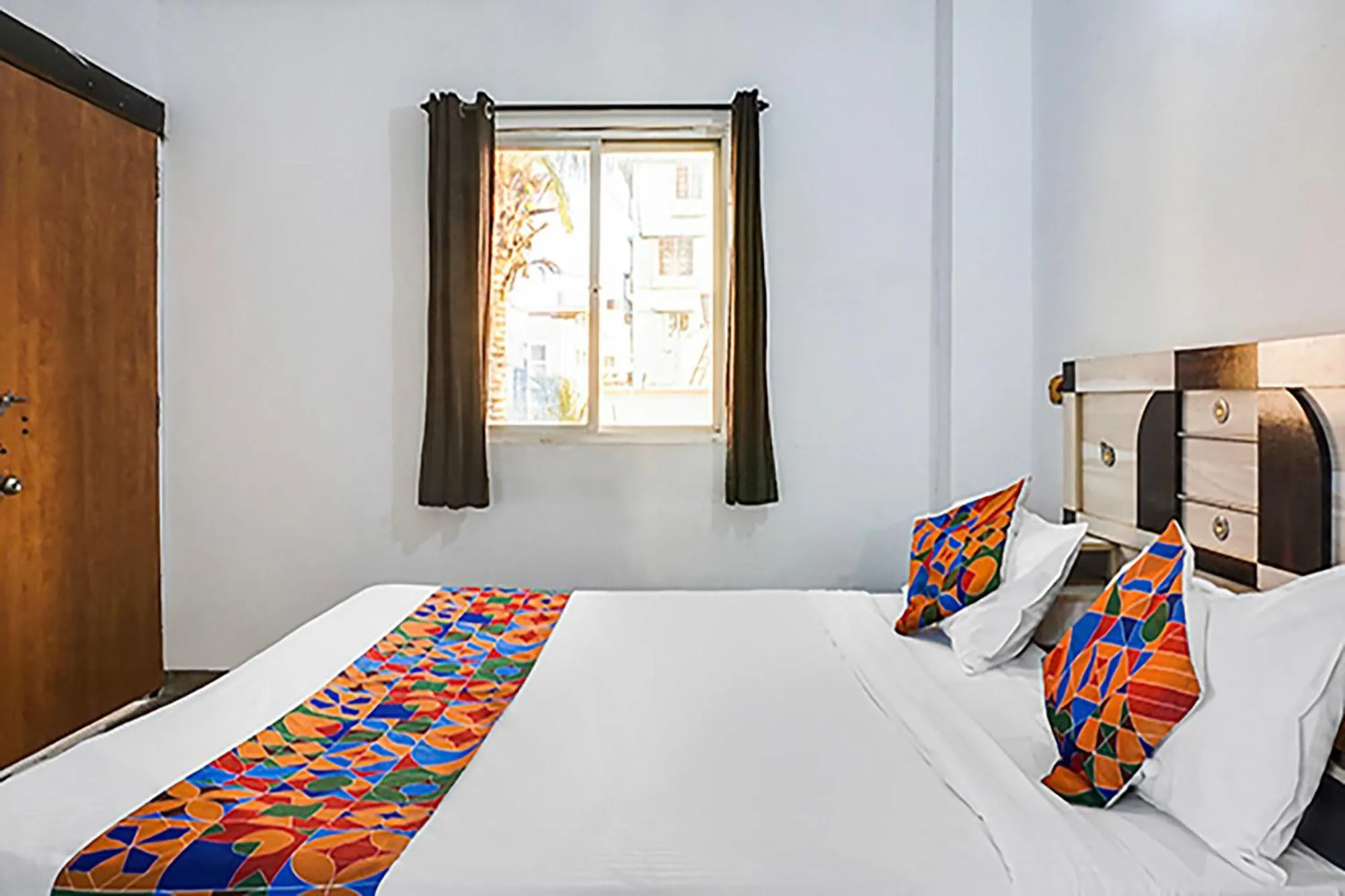 Bed in FabHotel Galaxy Airport Inn, Airport Road