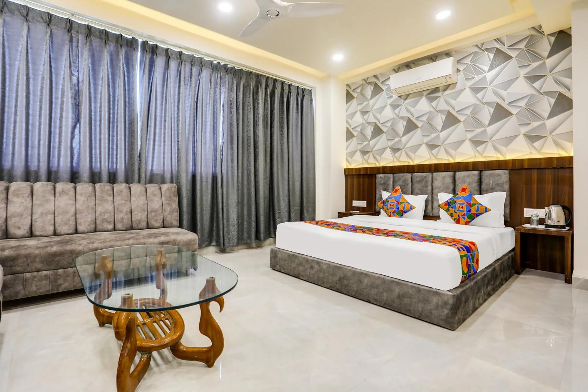 Bed in FabHotel Prime Panchwati Regency