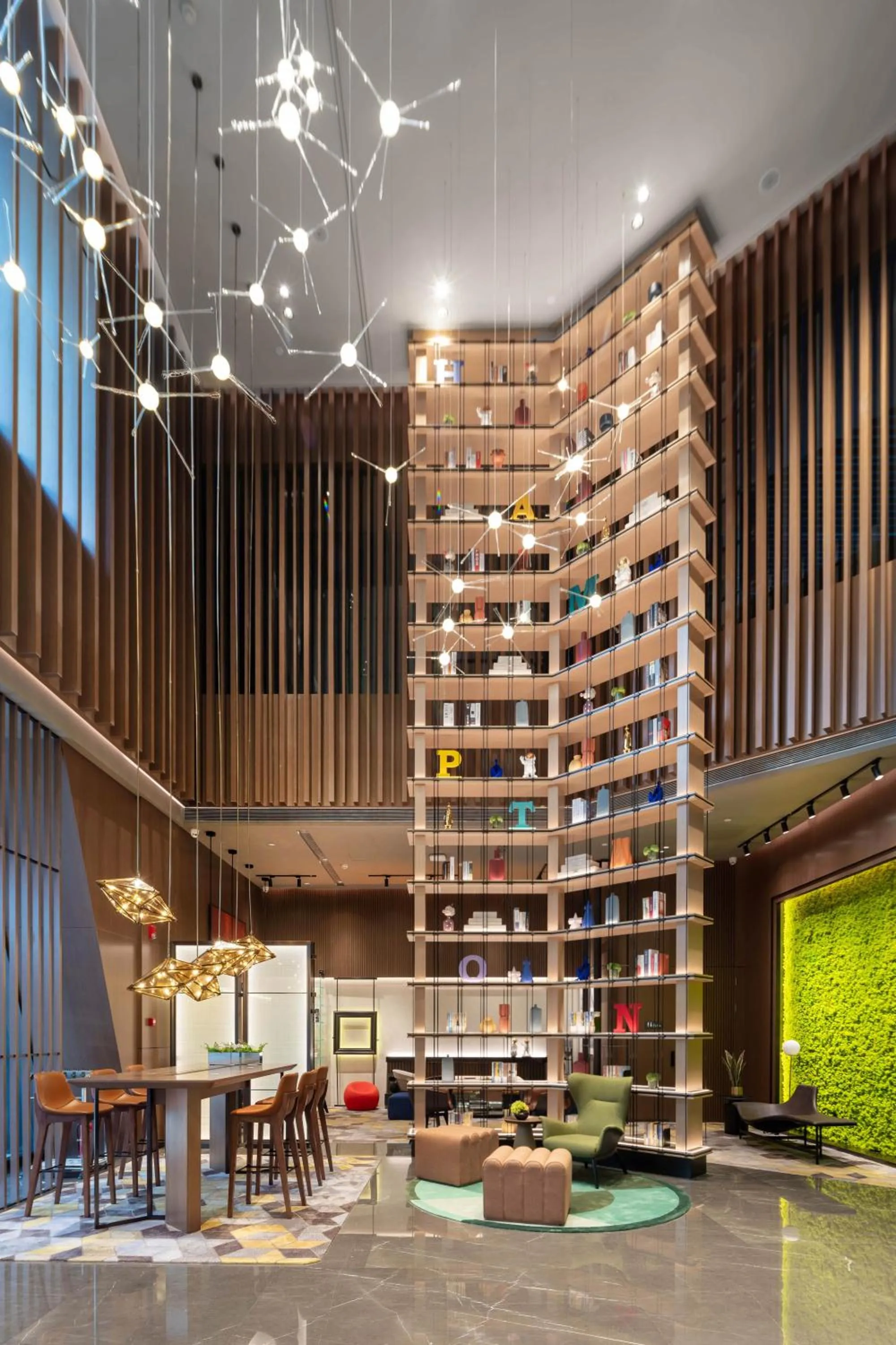 Communal lounge/ TV room in Hilton Hotel by Hampton Wuhan Zhongnan Street Branch