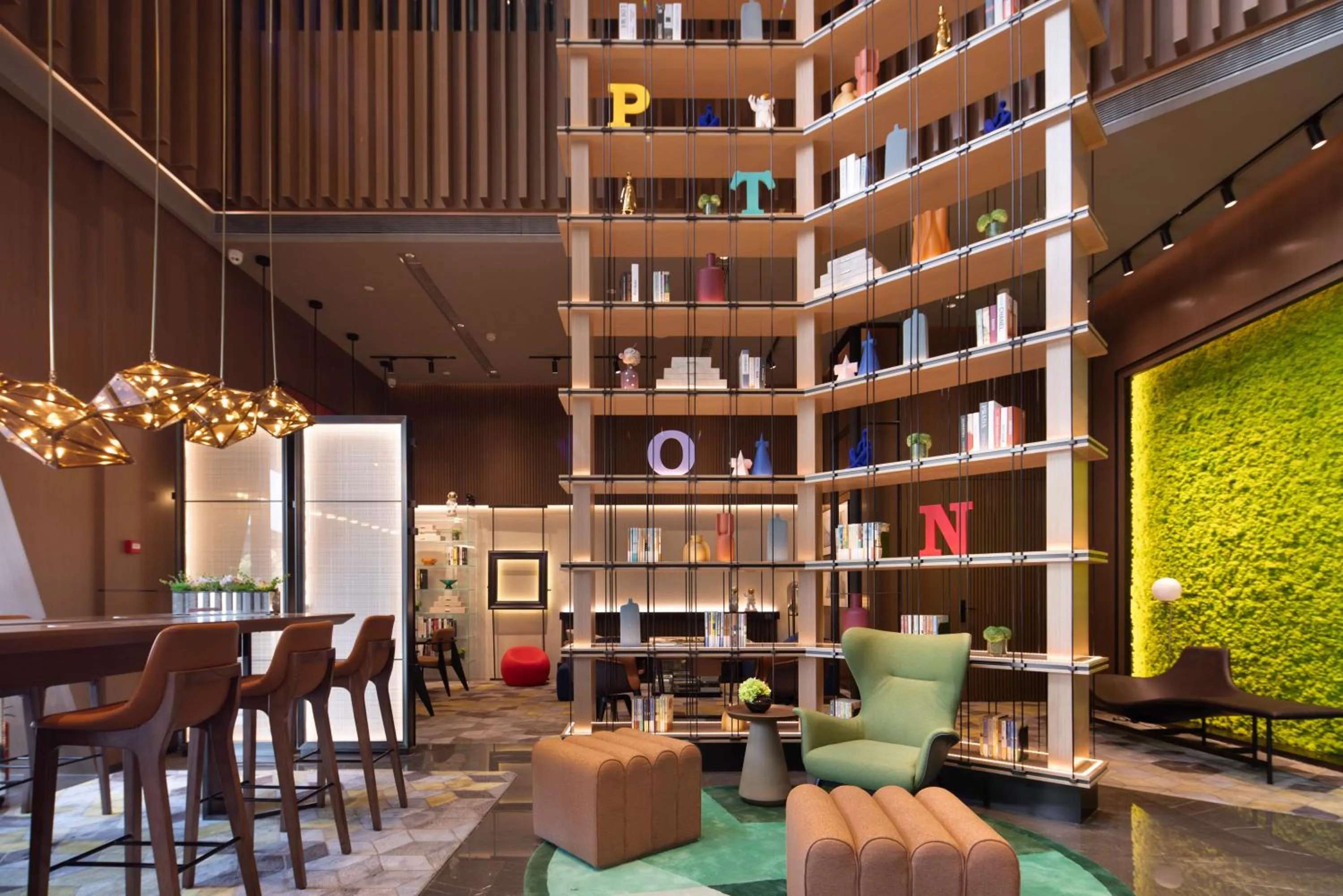 Communal lounge/ TV room in Hilton Hotel by Hampton Wuhan Zhongnan Street Branch