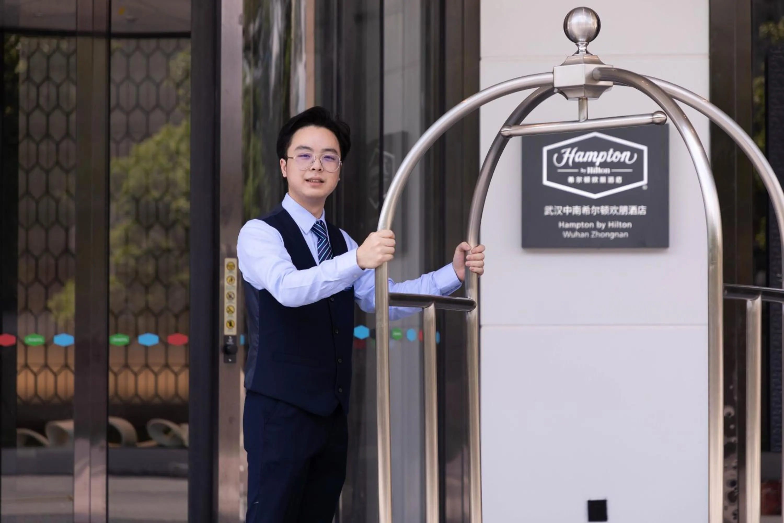 Property logo or sign in Hilton Hotel by Hampton Wuhan Zhongnan Street Branch