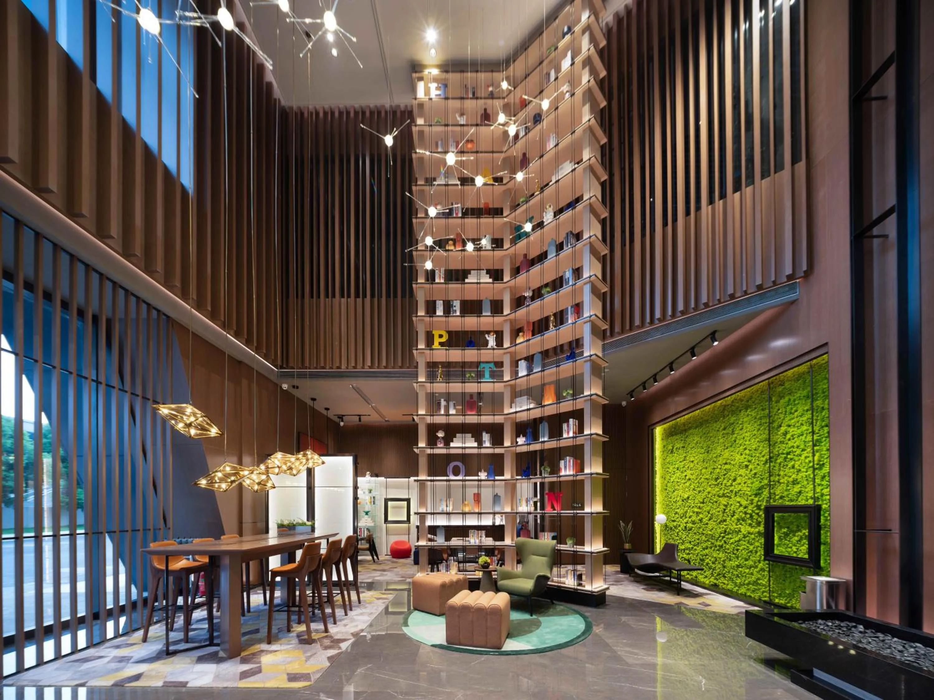Communal lounge/ TV room in Hilton Hotel by Hampton Wuhan Zhongnan Street Branch