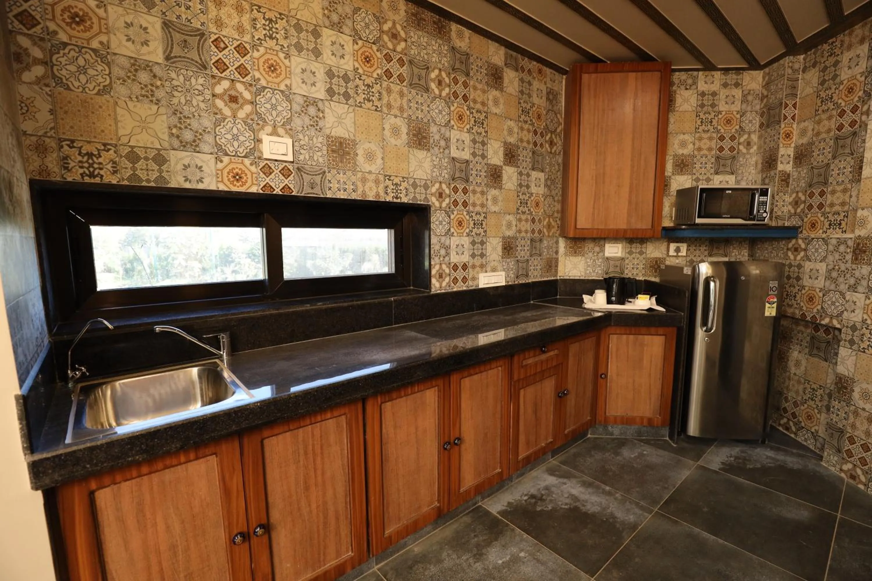 Kitchen or kitchenette in Neonz Resort & Club