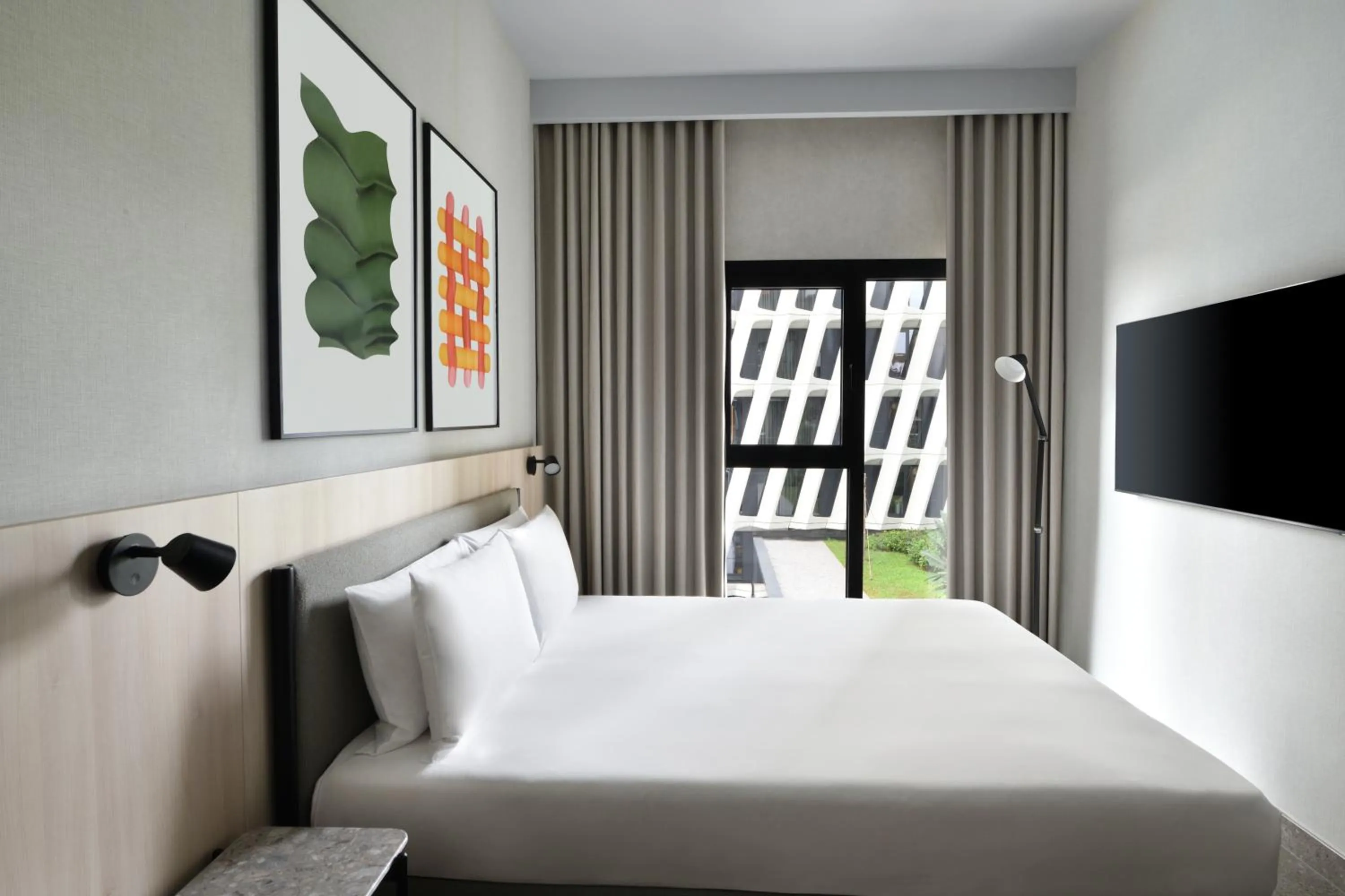 Bed in Aparthotel Adagio Abidjan Marcory