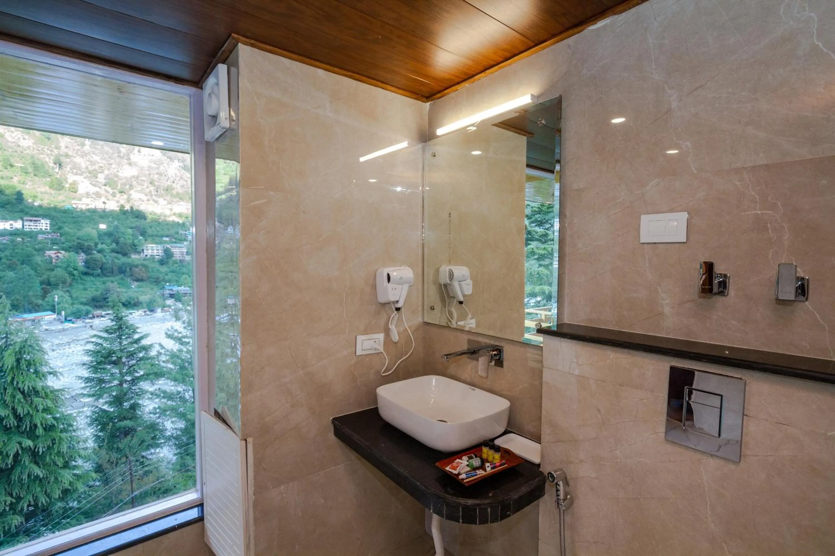 Bathroom in Tripli Hotels Namaste Manali