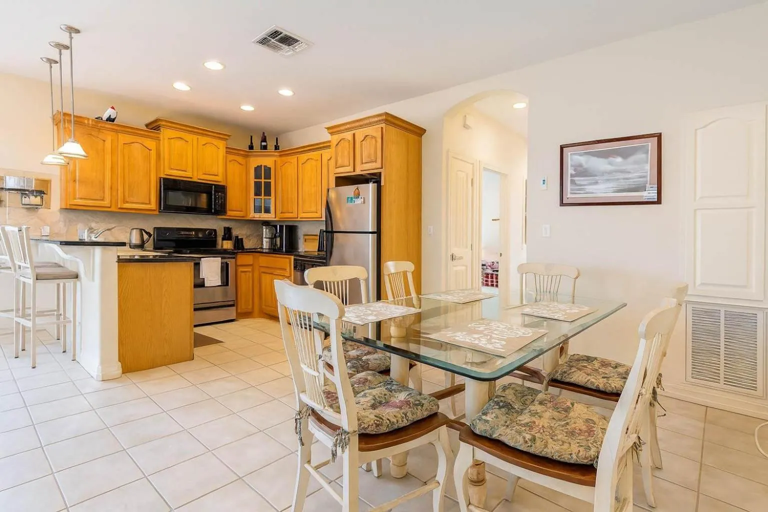 Dining area in Beach & Palms condo