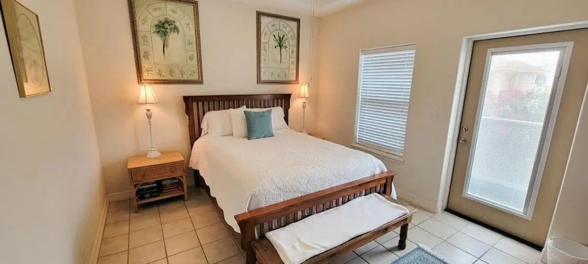 Bed in Beach & Palms condo