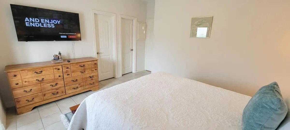 Bed in Beach & Palms condo