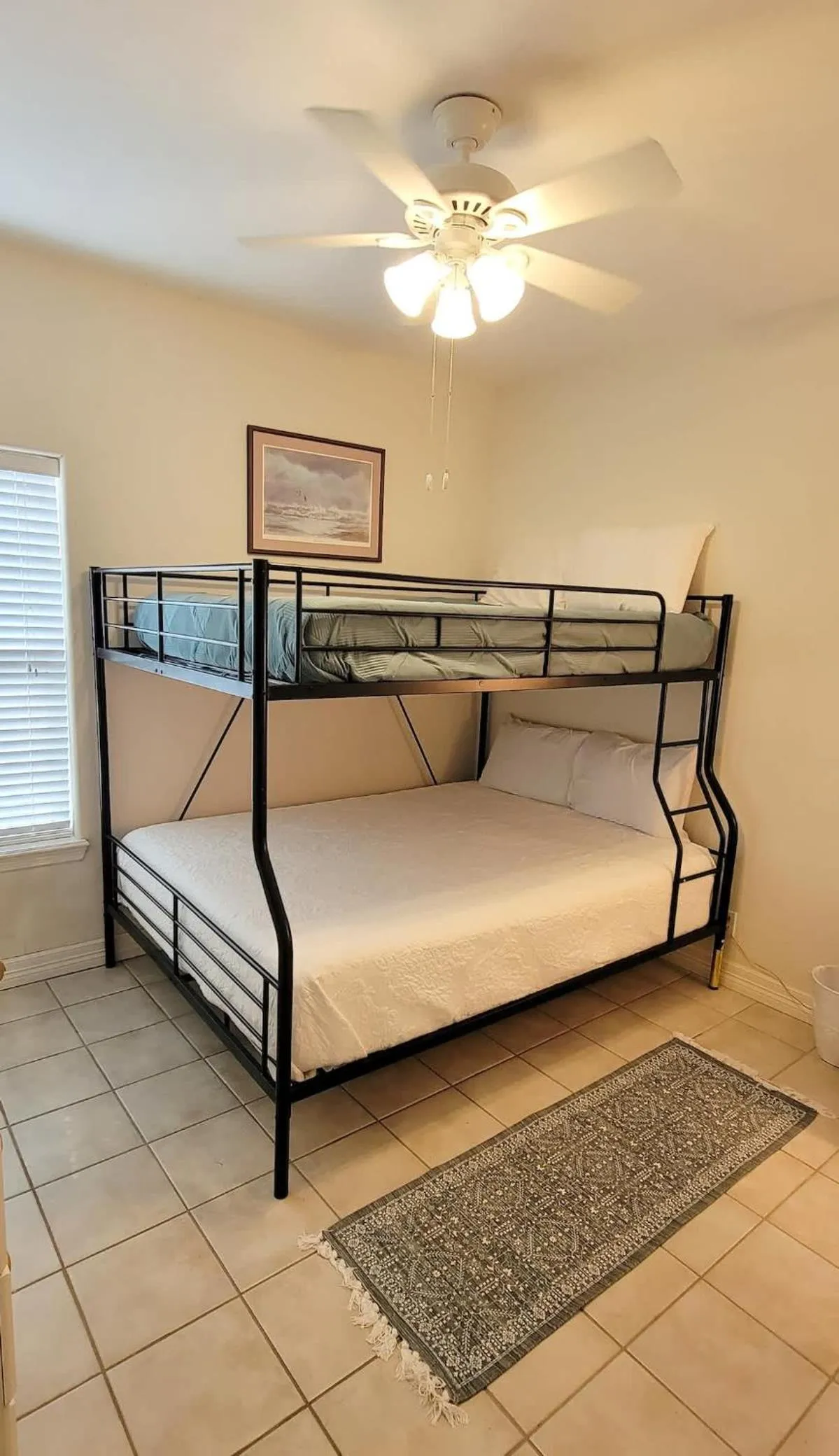 Bed in Beach & Palms condo