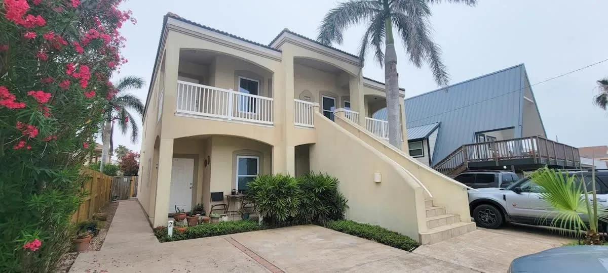 Property building in Beach & Palms condo
