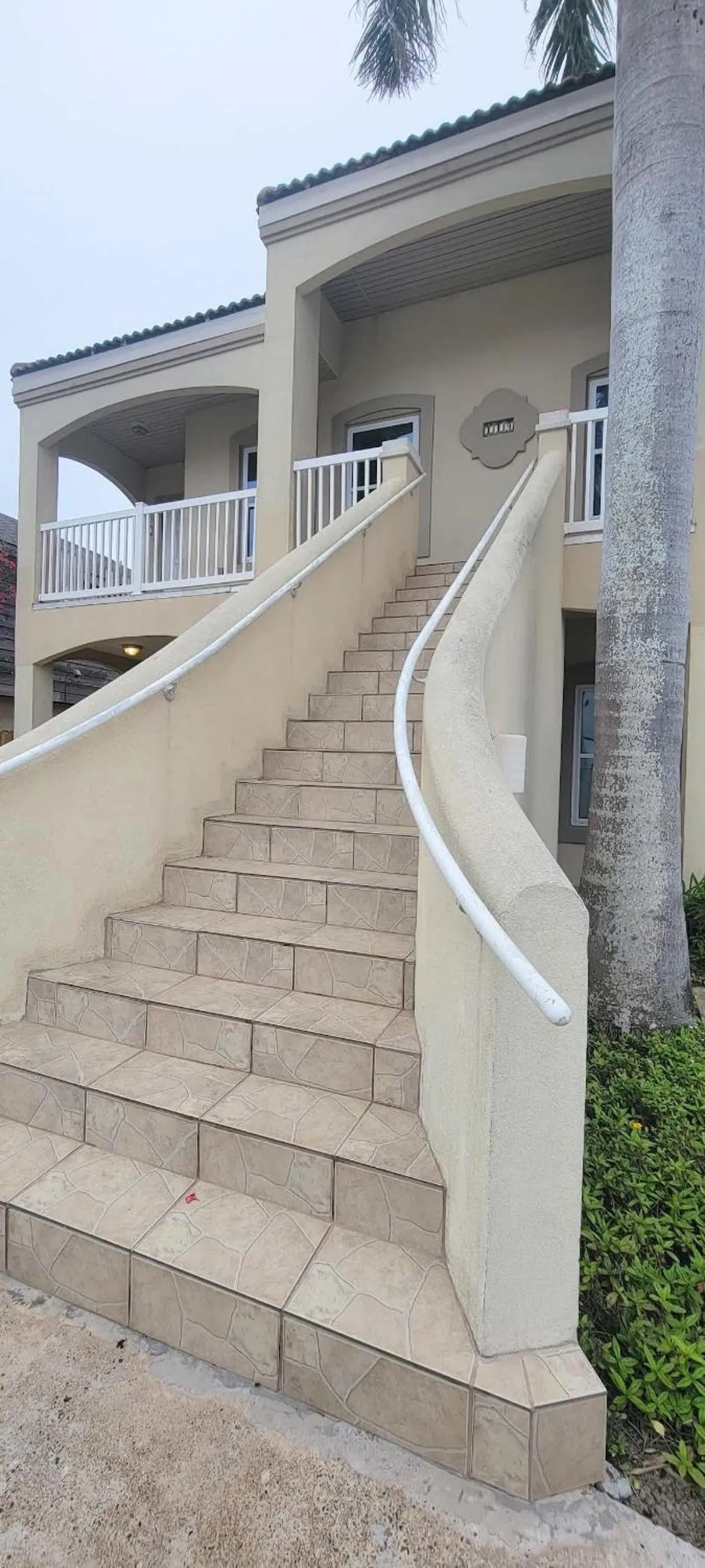 Property building in Beach & Palms condo